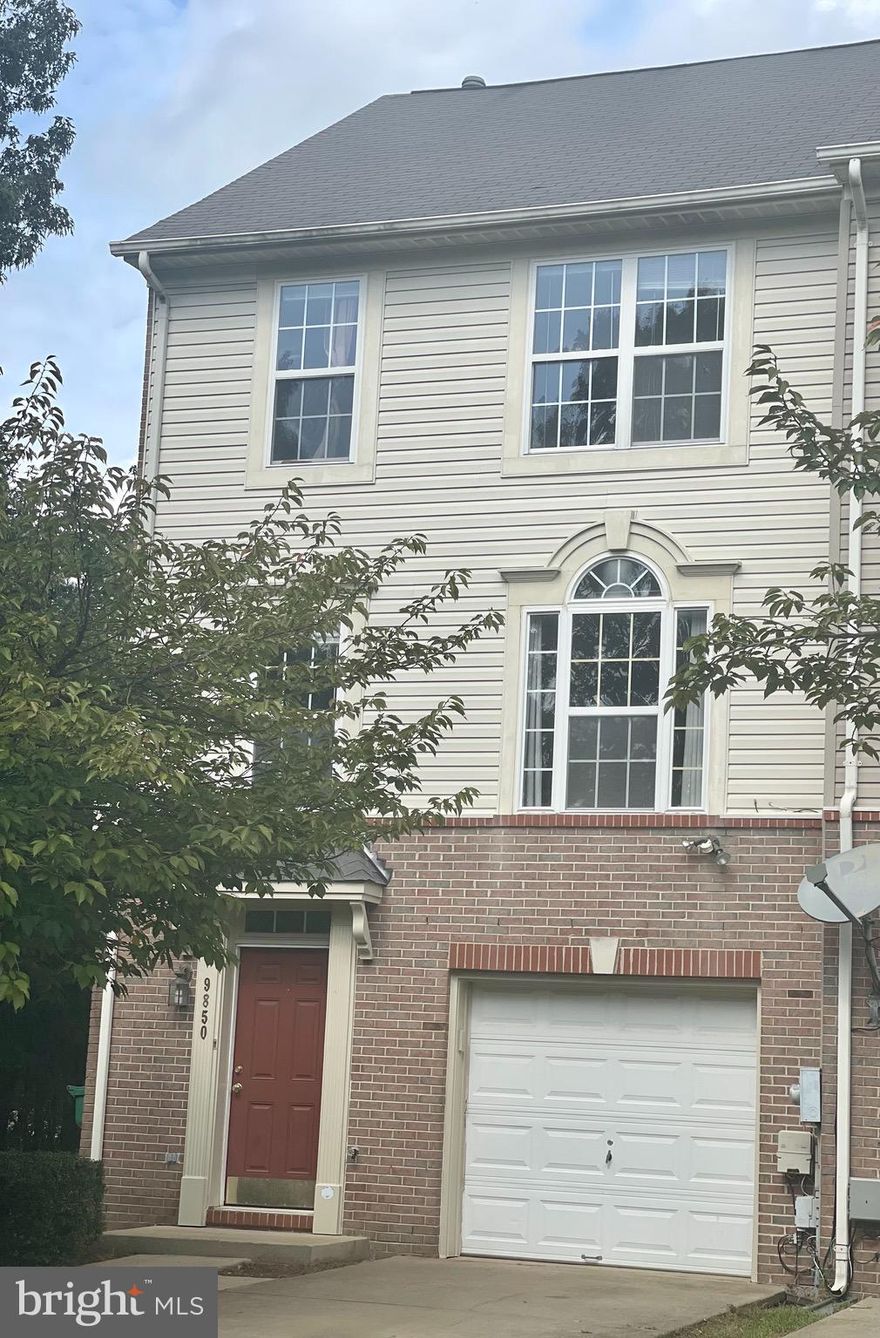 Appln Registered 4/21 Complete applications processed as received!  Honey  stop the car!  This is the one you've been searching for with all the bells and whistles.  End unit three brick townhouse with over2000 square feet of finished living space.  Main level with garage parking and  family room.  Middle level with large  kitchen with island and open floor plan.  Primary suite with separate tub and shower and two additional bedrooms and hall bath complete the third level. Conveniently located to shopping, malls and restaurants.  Don't delay.  Show and apply today via Rentspree.