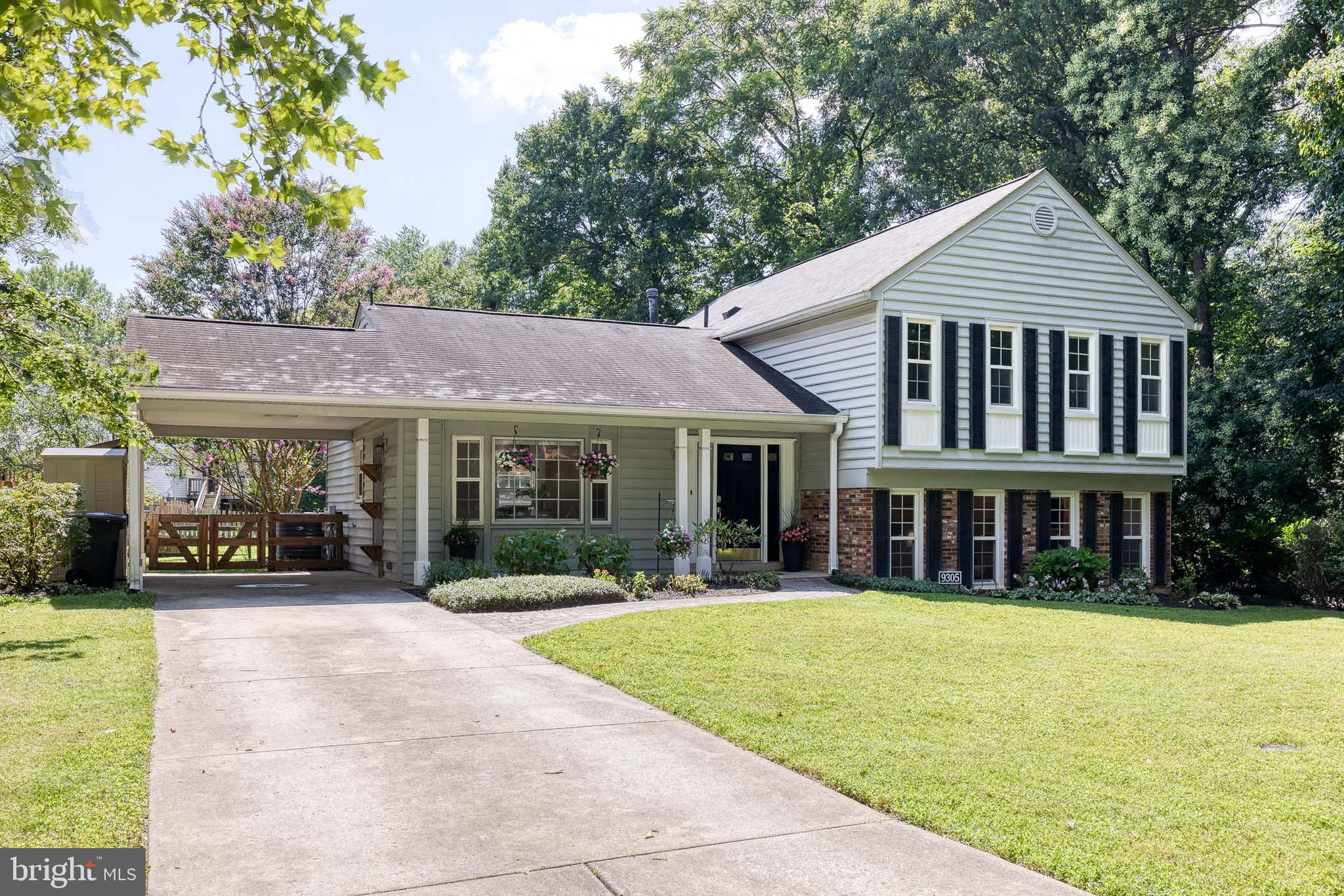 Welcome to 9305 Soaring Hill Road, a beautifully maintained and freshly painted 5-bedroom, 3-full-bath home nestled in a serene Columbia setting. This spacious residence offers a large open floor plan ideal for both everyday living and entertaining. There are two inviting living room areas—one on the main level and a second on the lower level featuring a cozy fireplace—providing flexible spaces for relaxing or gathering. Step outside from the main level to the Trex deck, where you’ll find peaceful wooded views—perfect for morning coffee or evening relaxation. Thoughtfully updated over the years, the home boasts a long list of enhancements, including a newly updated primary bathroom (2024) and a new water heater (2023). The hall bathroom was stylishly refreshed in 2020, while the HVAC system, including a new furnace, compressor, and whole-house humidifier, was replaced in 2019 for year-round comfort. The kitchen and main floor living area were tastefully updated in 2016, creating a bright and modern space for cooking and gathering. Additional updates include the lower living room (2015) and downstairs bathroom (2014), ensuring every level of this home is move-in ready. On the lowest level, you'll find an unfinished basement that offers plenty of storage and room for future customization. Completing the package is a private driveway with a carport for added convenience. Located in a desirable Columbia neighborhood with easy access to trails, parks, and major commuter routes, this home offers comfort, space, and style in a beautiful natural setting. Don’t miss the opportunity to make this exceptional, freshly painted property your next home!