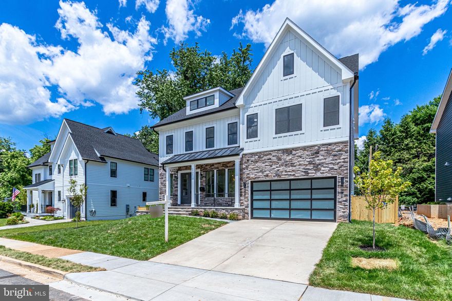 ** THE HOUSE NOW IS COMPLETED   ** New Construction in the area of North Arlington. Located on a quiet street, private road, located in the very desirable COUNTRY CLUB MANOR subdivision. This contemporary craftsman home will be more than 5,000 square feet of luxurious living space with an attached two-car garage. Hardwood floors, marble countertops, professional-grade appliances, and an elevator are just a few of the distinctive upgrades in this elegant home. The main level of this home features a great room with a fireplace with doors on either side onto a screened porch with additional doors in the back leading to an expansive deck. The kitchen with a breakfast area has a walk-in pantry and a center island along with many upgraded fixtures. The second floor is where you will find the owner's suite, complete with a sitting area,  fireplace, wet bar dual custom walk-in closets, a spa-like bathroom, with a separate shower, and a relaxing FREE STAND bathtub. There are three additional bedrooms, two full baths, and a laundry room. The fully finished lower level features a theater and an additional bedroom and bath, with elevator access to all three levels! Desirable location less than one mile from Washington Golf and Country Club, and Marymount University. Easy access to major freeways and local routes to both Dulles and Regan National airports, makes commuting in the metro area a breeze, whether going to and from various employment hubs, a day trip to the Shenandoah national park, or sightseeing in Washington DC.