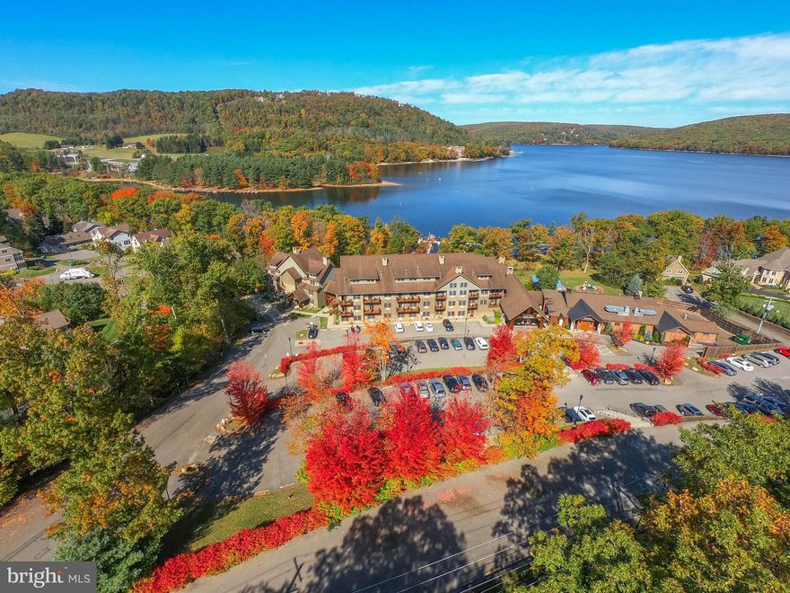 Don’t miss this opportunity to own a beautifully updated 1-bedroom unit at Silver Tree Suites on Deep Creek Lake! This turn-key condo features recent flooring upgrades and is truly turn key, making it an ideal vacation retreat or income-producing rental. This particular unit offers a unique L-shaped layout, providing extra square footage and a more spacious feel compared to other efficiency units. Enjoy all the comforts of home with the added convenience of on-site amenities, and experience lake living at its best in one of Deep Creek’s most sought-after locations.