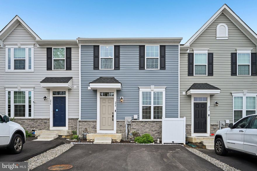 LUXURY LIVING WITHIN REACH! Stunning townhome built in 2024 offering a modern design with PREMIUM FINISHES and an OPEN-CONCEPT main level, this home shows like a model home! The spacious living room flows seamlessly into a dream kitchen, complete with 42” cabinets, QUARTZ COUNTERTOPS, stainless steel appliances including a top-of-the-line refrigerator, a generous CENTER ISLAND WITH SEATING, and a pantry. The adjacent dining area provides direct access to the rear deck through a sliding glass door, ideal for entertaining! Complete with a half bath for guests. Upstairs, the primary suite boasts a TRAY CEILING, WALK-IN CLOSET and an ENSUITE BATH with a dual vanity & a walk-in shower. Two additional bedrooms share a well-appointed full hall bath and the 2ND FLOOR LAUNDRY offers ultimate convenience. The WALK-OUT DAYLIGHT FINISHED BASEMENT offers flexible additional living space, ideal for a media room, home office, gym, or playroom, and boasts sliding doors that lead to the backyard. A large unfinished storage area ensures you'll have plenty of storage space. Great location at the END OF A CUL-DE-SAC. Close to shopping, restaurants, schools and easy highway access. Nothing to do but move in!