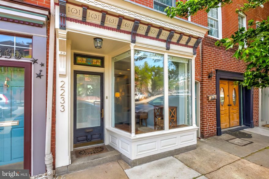 Charming and updated 2 bedrooms, 1.5 bath home just one block from the harbor! So much to be adored here. Gorgeous kitchen renovation (2016), rooftop deck with great views, large windows and skylights, exposed brick, hardwood floors, patio space, and massive basement storage. Further updates include full HVAC replacement (2012), shingle roof redone (2016), and liquid membrane roof replaced (2018). Move right in and enjoy! Steps from the waterfront, parks, great restaurants, and shopping!