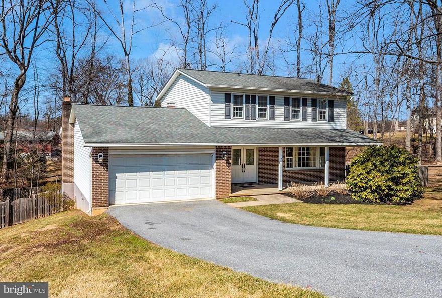 First Time Offered!  This Beautiful, nicely updated colonial, offers a cul-de-sac setting, fully fenced back yard, two car garage and full walkout basement.  The main level features include a family room with wood burning fireplace, formal dining room, living room, foyer and custom kitchen with updated stainless-steel appliances.  The upper level offers two full bathrooms and three bedrooms with hardwood floors.  The primary bedroom was doubled in size and offers a full walk-in closet and private bathroom.  The finished basement features a full bathroom with custom tile work, California corners on the drywall finishes, full laundry room, a second family room or guest quarters, a workshop and a strong room for multiple uses.  This level walks out on to a custom paver patio with hardscape walls and stone edged flowerbeds.  This home is a must see!