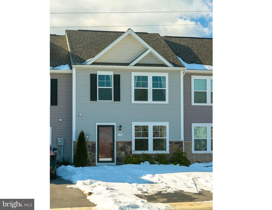 Welcome to this stunning 3-bedroom, 2.5-bathroom townhome, built in 2021, offering 1,480 sq ft of beautifully designed living space. As you step inside, you'll be greeted by luxurious vinyl plank flooring that extends throughout the main level. The spacious family room seamlessly flows into the well-appointed kitchen, complete with gorgeous maple cabinetry, sleek granite countertops, upgraded stainless steel appliances, and a generous kitchen island—ideal for meal prep or casual gatherings.  An inviting morning room addition off the kitchen provides a bright, dedicated space for dining. A sliding door leads you out to a 15x8 patio, perfect for outdoor dining or relaxing, with the added bonus of a built-in shed for additional storage.  Upstairs, the expansive primary suite offers a walk-in closet and a private en suite bathroom featuring a rain shower head for a spa-like experience. Two additional spacious bedrooms share a full bathroom, and the convenient laundry area is located on the upper level.  Enjoy the peaceful, wooded views behind the home, where mature trees provide a serene backdrop to your patio space. This beautiful townhome is the perfect blend of modern comfort and style—schedule a showing today!