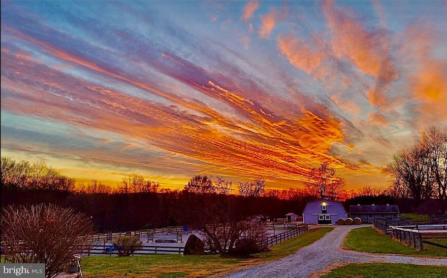 OPEN HOUSE Friday 10/20 3-6pm!!!


Stunning views from every window of this 3836sq ft custom built Dutch Colonial style home. Drive in thru the gateway and enter a quiet private oasis. Mature flowering landscape, pastoral views and a 9 acre wooded buffer make for privacy a serenity. Sit on the Wrap around front porch to enjoy watching horses being ridden in the ring or enjoy the beautiful sunsets. 5 bedrooms and addition 6th bonus room upstairs accessed by 2 staircases. ( in-law suite potential) 2.5 bathrooms all generous sized. Relax in the large front room with a stone wood burning fireplace or eat in the large dining room with its own stone wood burning fireplaces perfect for holiday meals. The Walk-out Basement with larger egress windows and higher ceiling for additional (unfinished) living space also has a chimney/flue for a stove.Walk-out the sliding doors onto the stone walk leads a patio (with electric service for a hot tub) Convent Laundry/Mudroom steps out into 12x12 deck facing the sunrise and a paddock. Prefect for morning coffee. Every room is generous in size to support a growing family or entertain. Updated eat-in kitchen , soapstone counter and island,SS appliances with a Pantry. 31 Large Anderson windows , the upstairs tilt in for ease of cleaning. 2 car attached garage and a 48x40 pole building with 5 12x12 overhead doors make for plenty of parking off the loop around driveway. Also a small floored shed for firewood storage. Additional parking space for your horse trailer,RV,or boat as well. Barn(s) 13 stalls,( 2 foaling) tackroom,feedroom w/ stairs to loft ,a wash stall. 10 paddocks ,7 run-ins. All cross fenced most in horse safe 4 strand polytensil and solar chargers. Well maintained paddocks. 190x99 ring and a 50x90 loose school ring. Only a 25 minute trailer ride to Fair Hill Nature Resources or Susquehanna Park. Major Veterinary University Hospital is 40 minutes. This area is rich in Vet,farrier,local hay feed services. For the serious rider or breeder the ability to access Top Caliber facilities is unlimited. 1/3 mile to boat ramp site onto Lake behind Conowingo dam for the fisherman or kayaker. Deer and wild Turkey on property if you enjoy hunting. 50 miles to PHL or BWI, easy onto the I95 corridor or train station at Perryville. 2.5 hours to NY. Commuting distances to Baltimore,Aberdeen PG ,Wilmington DE. Property sells “AS IS”.