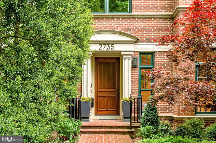 2735 Cathedral Ave NW is a turn-key, designer showpiece.  Extensively remodeled in 2021 by the current owners, the approx. 8,266 SF home with an elevator servicing all 5 levels is complete with 6 Bedrooms, 6 Baths, 3 Half Baths, incredible scale of 10" Main Level ceilings and 9" ceilings on the 2nd, 3rd, 4th Levels, and 8'8" on the LL; expansive roof deck with monument views and penthouse kitchen, 5-car parking including a 2-car garage with Tesla EV Charger, 3 gas straight-line fireplaces, all new HVAC systems, and more! The gourmet custom Chef's kitchen includes SubZero and Wolf appliances, Caesarstone countertops, French Hot Spot, steam oven, and separate Butler's Pantry with icemaker and wine refrigerator. The rear patio and garden is perfect for al-fresco entertaining with unique water feature and access to the lower level. The main level double-sided fireplace is flanked by the front Gallery/Living Room with views of the front garden, and the Dining Room with connecting door access to the butler's pantry and kitchen. The second level is comprised of 3 Bedrooms, each with en suite designer Baths, and an additional steam room. The third-level Primary Suite is robust with 3 walk-in closets, Bath with dual vanity, a soaking tub, and a walk-in shower. The 4th Bedroom / Art Studio includes a private balcony overlooking Cathedral Ave and en suite Bath. The Penthouse level has a full Kitchen and Powder Room to service the 1,200 SF Roof Deck with a built-in fire table and views of the Washington Monument! The Lower Level has an additional in-law bedroom suite, Media Room with a floor-to-ceiling gas fireplace, a Wine Room with a custom kitchen, and multiple storage rooms and closets. This property is in a sought-after location with convenient access to the Woodley Park Metro, the National Zoo, and all of the restaurants and retail of the Connecticut Ave Commercial Corridor, and Dupont Circle just across the Taft Bridge. This is one of the largest homes in Woodley Park with an abundance of parking, elevator, outdoor space, and amazing scale! It is truly one-of-a-kind!