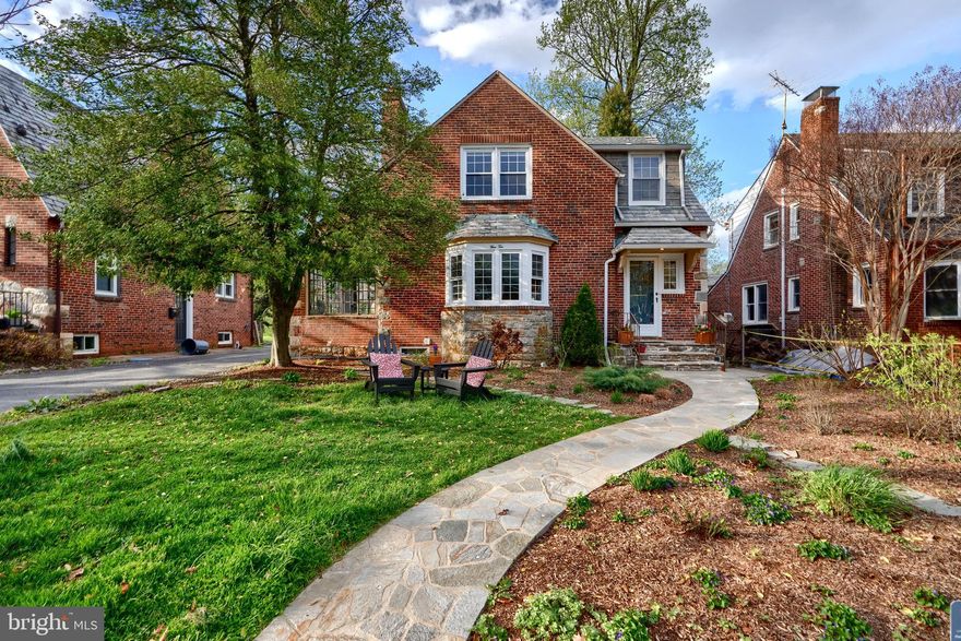OPEN HOUSE SAT/SUN 4/26 & 4/27 - 1-3pm!..Welcome to Storybook Anneslie!...3BD/2BA .Tudor Style Home nestled on tree-lined picturesque Overbrook Rd! This enchanting Tudor home blends timeless character with updated modern comforts! Step inside to discover hardwood flooring throughout, a stone fireplace, and quaint sunporch -perfect for a home office or reading nook!...Second Level offers Bright spacious bedrooms with custom California-style closets & popular black/white subway tile Full BA!...ALL NEW Lower Level Media/Recreation Room ((2021) offers glazed exposed brick & second fireplace!- 2nd Full BA - Spacious area for entertaining or play room too!- Arched doorway greets you to the dining room & timeless white kitchen w/NEW Appliances!- Refrigerator(2024), Stove (2021)abundant storage and eat-in space too.....Kitchen  opens to private backyard with mature landscaping & a lovely patio space-great for weekend BBQs or quiet evenings around the firepit. Pride of ownership with NEW Central AC installed (2019), All new plumbing (2022), stone walkways (2022) -an extensive list of updates is uploaded to this listing! Garage addition - Great additional storage!... A short walk to TOP RATED Stoneleigh ES, Dumbarton MS & Towson HS. This magical home in a highly sought-after school district offers the perfect place to begin your next chapter!