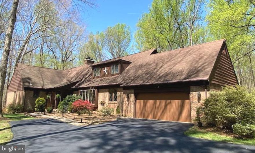 Custom built home located within The Holly Forest community, is your perfect, private retreat on 5 acres in Fairfax Station. Upon entry you are greeted with the view of the living room. It has vaulted ceilings, a beautiful fireplace and expansive windows that brings the outdoors in. Walk towards the back of the house and you will see the renovated gourmet kitchen that has a large kitchen island. Proceeding through the kitchen you will see a large separate dining room, with chair railing and more expansive windows. The next room is a warm family room. The opposite side of the main level has three bedrooms and two full bathrooms. Travel up the stairs and you will find the Primary Suite. It is complete with a huge bedroom, separate sitting room (or den), dressing rooms, and primary bathroom. The basement is finished and has a large recreation room with wood stove, game area and bar. The bar has a working antique refrigerator that will convey with the property. Downstairs is also bedroom #5, full bathroom with a sauna, exercise room and another finished room. So many possibilities for this space! Leave out the back door and you will enter your outdoor oasis. There is a 630 sq ft inground swimming pool. The trees have been cleared in back to allow in plenty of sun while enjoying your oasis. There is a ground level patio with gazebo and a firepit. You can enter your backyard oasis from the main level of the house as well. The back door near the kitchen leads to a huge deck, with electric retractable awning, that overlooks the pool and yard. This property has been meticulously cared for. Kitchen remodeled in 2012, basement finished in 2013, well pump replaced 2021, water heater replaced 2021, Driveway resurfaced 2022, new carpet upstairs 2022, Heat Pump replaced 2013, backup oil furnace replaced 2013. There is an underground storage tank for the backup oil heat. The Holly Forest Community has horse trails throughout and horses are permitted. This property is a private retreat that is convenient to shopping, dining and commuter options. It is close to the town of Clifton, Burke Lake and George Mason University. Close to Rt 123, 66, Fairfax County Pkwy and I95 commuter routes. Outstanding Robinson High School pyramid. Schedule your viewing today! Photos and Matterport will be uploaded prior to active on the market.