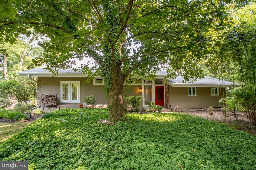 Plans for this home were crafted in 1964 for lasting relevance incorporating a more modern approach in design and a well-honed architectural concept. Tactile exhibitions throughout the interior include a massive stone fireplace which is the focal point in the cathedral ceiling living room while the openness of the kitchen directly to the stone walled dining room provide cool layers of stone and wood textures. The lower level of the home opens to ground level in the back of the property and could be readily finished into additional private living space. Whole home generator (details unknown as electric panel unmarked). Beyond the Anthony & Sylvan Pool (2016) and separate12x21 studio building (with electric), the property backs to preserved horse farm pastures. With a generous 2.49 acre parcel, privacy is ensured. What is needed now is a steward who can embrace what is and advance the possibilities. This is an Estate that will be sold “As Is” to that special someone who appreciates the uniqueness and character of the property and its setting on one of the most beautiful and bucolic roads in Bucks County.
