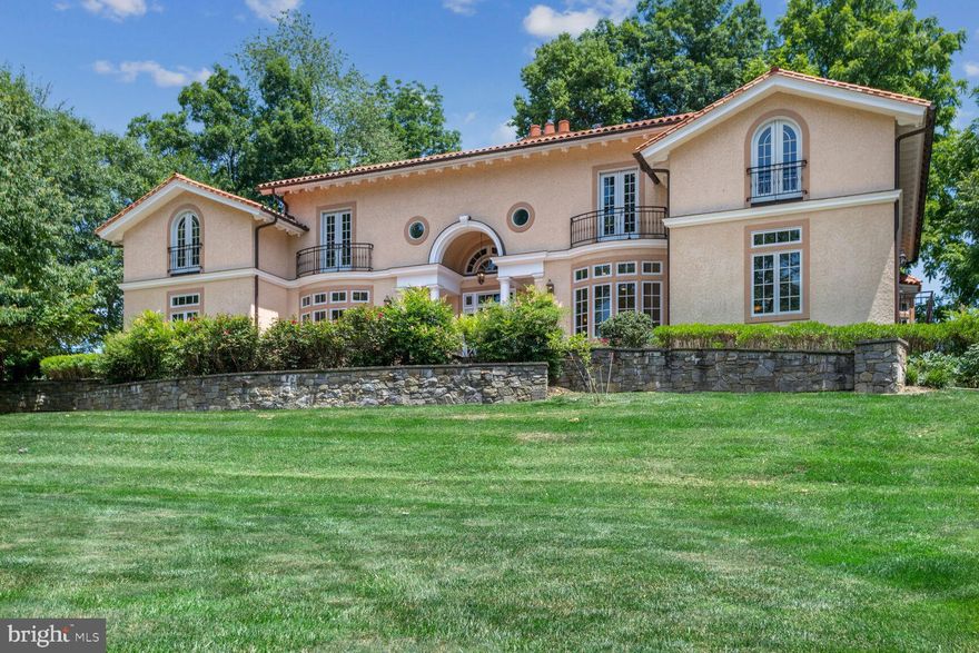 This beautiful and impressive Mediterranean style residence commands a  special location in Potomac's famed Merry Go Round Farm neighborhood, with views of community pastureland and neighboring luxury homes. The 7-bedroom, 7-bath home, custom built for the current owner in 2005, sits on a private .65 acre lot and offers a total of 10,000 square feet of versatile living space, with 2 separate garages for 3 cars, and a gorgeous roof of tiles imported from France.  Ideal for entertaining as well as everyday living, the house is approached via a circular drive, with extra parking, providing a welcoming entry for guests.  The impressive entry foyer leads to the home's lovely, light-fulled interior, featuring large living spaces, great ceilings heights, beautiful windows and trim work, imported tile and hardwood flooring, an elevator serving all three levels, and French doors leading to the landscaped grounds and balconies. A large Living Room with fireplace sits at the center of the residence. The elegant Dining Room with bay window sets the stage for entertaining on a large scale. The 2-story Family Room provides ample space for casual activities and relaxation. The large center isle gourmet kitchen provides every chef's needs, with plenty of counter space and ample table space. A unique and exciting feature of the house is its large, separate main level suite  which is a complete living unit with a large bedroom, living area, bathroom and full kitchen - perfect for guests and multigenerational living. The upper level of the home offers 5 bedrooms and 4 full baths, including a magnificent primary bedroom suite and bathroom, with pastoral views that often include a glimpse of horses.  The upper level loft area may serve as a study area/office. The lower level of the residence offers so much space - including a theater room, gym, recreation room, bedroom and full bath. 3 zones of heating and air conditioning and copper gutter system in this public water, public sewer home, attest to the quality of fixtures and construction. This truly unique and lovely home presents a wonderful opportunity to enjoy luxury living in a highly sought-after location near Potomac Village and award-winning private and public schools. Enjoy your visit!

****The Merry Go Round community offers a 204-acre enclave near near the Potomac River, of 81 homes clustered in separate sections, with common grounds including an equestrian center with stables and pasture, miles of forest trails for hiking and riding, 3 small lakes and several large rolling fields, perfect for picnics and cross-country skiing or sledding. Groundskeepers and barn staff live onsite and tend to the land and the horses under the direction of the homeowners association, of which all residents are members.