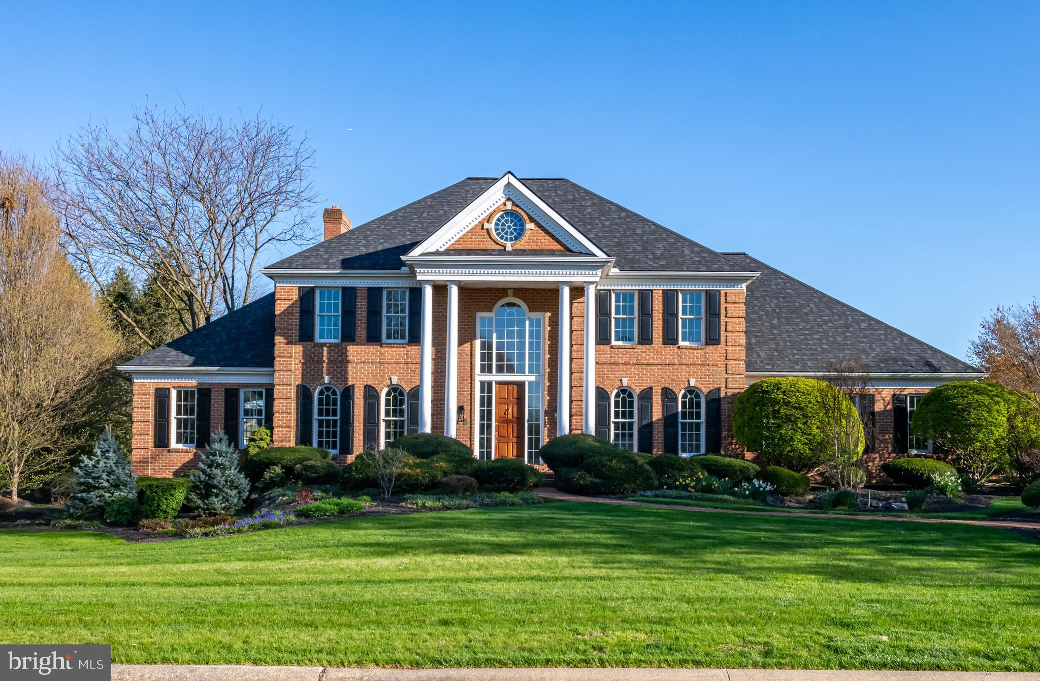 Perfectly located with gorgeous golf course views in the Bent Creek Country Club community and Manheim Township School District—just minutes from Reidenbaugh Elementary—this custom-built EGStoltzfus former Parade Home blends timeless design with everyday comfort. A striking brick exterior and manicured landscaping welcome you inside to a grand two-story foyer with marble floors and elegant columns. The home features four bedrooms, three full baths, and two half baths, plus a fifth bedroom and full bath in the finished lower level. The gourmet kitchen includes professional Dacor appliances, gas cooktop with a downdraft fan, and a large island with prep sink. A cheery, bright sunroom off the kitchen overlooks the golf course, offering a peaceful spot to relax. The main level also provides a family room with fireplace and dry bar, living room with fireplace, a formal dining room for hosting gatherings, and a spacious bonus room versatile for a home office, library, or billiards room. Along with a bedroom and full bath, the lower level, with access from the house and garage, adds space for TV, games, and more along with a wine closet and cedar storage closet. Upstairs, the primary suite boasts a sitting area, large private bath, walk-in closet, and your own balcony with more views of the beautiful green golf course. Three additional bedrooms are located on the second floor, one with an attached bath, and two sharing an adjacent full bath. A three-car garage connects to a mudroom and laundry room. Additional amenities include a security system, central vacuum, and an irrigation system for keeping the yard looking its best year-round. Life in Bent Creek goes beyond the walls of your home. The community enjoys a vibrant lifestyle with various membership options, like golf, tennis, and swimming. Don’t miss your chance to own this exceptional home. Schedule your private tour today.