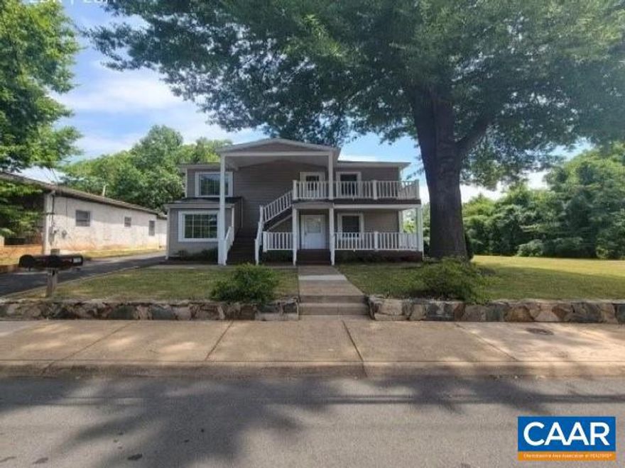 Don?t miss this exceptional investment opportunity just 3 blocks from the vibrant Charlottesville Downtown Mall. This over/under duplex was extensively renovated in 2019 and offers modern amenities, reliable rental income, and development potential. Property Features: New HVAC, electrical, plumbing, bathrooms, kitchen appliances, cabinets (Unit A), lighting, flooring, windows, doors, Trex decking, roof, and stackable washer/dryer units. Unit A: 1,028 sq ft, 2BR, 1.5 BA,  and access to a 325 sq ft unfinished basement. Unit B: 812 sq ft with 2 BR, 1 full BA  Both units feature private front and rear decks, in-unit laundry, and updated finishes throughout. Parking: Off-street parking in the rear for up to 4 vehicles, plus ample on-street parking. Location: Walkable to restaurants, shops, and public transportation. Adjacent to the expansive IX property. Income Potential: Unit A: Currently rented at $1,975/month. Unit B: Currently rented at $1,980/month. Development Opportunity: Located next to a vacant lot and benefiting from newly approved NX-8 zoning, this property holds significant potential for or future development or expansion, especially given its proximity to the growing IX Art Park district.,Formica Counter,Wood Cabinets