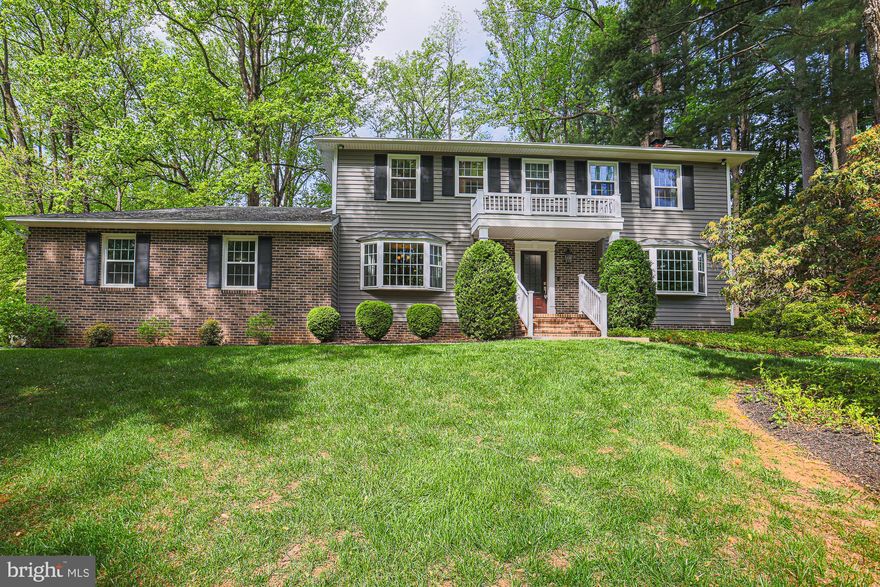 STUNNING 4 Bedroom 2 FULL and 1 HALF Bath Colonial in Towson * Features Include:  GORGEOUS kitchen with GRANITE countertops, backsplash and stainless steel appliances * SUN FILLED dining room overlooking wrap around deck * The  family room has an electric fireplace * The EXPANSIVE living room has an Wood burning fireplace and crown molding  * Cozy den with bay window and utility room on the MAIN level * Recessed lighting * GLEAMING hardwood floors * Fresh paint * Gas generator * New insulation in attic * The UPPER level offers a BEAUTIFUL primary suite with a large bathroom and walk in closet, 3 additional bedrooms and a FULL bath * On the LOWER level you will find a REC room, additional space, PLENTY of storage  and walkout * TWO car side entry garage with IMMENSE driveway parking * This fabulous home is a retreat with tons of privacy and has been well maintained * Make your appointment today!!