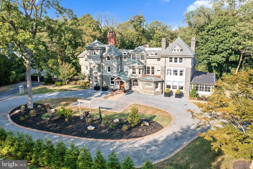 Welcome to the Dolobran Estate, a rare opportunity to own a magnificent piece of history on the Main Line!! Originally designed by renowned Philadelphia architect, Frank Furness, this 7 Bedroom, 7 Full  and 2 Half Bath masterpiece was built in 1881 for shipping magnet Clement Griscom as his family's summer retreat.  Featured as the Vassar showhouse in the early 1990's, and again extensively renovated from 2012-2014, this property has finally been restored to its former glory, offering  the most discerning buyer the perfect combination of distinguished architectural grandeur while harmoniously blending with modern amenities.  As you enter the grand Foyer, you will be mesmerized by the many hallmarks of a by-gone era, beginning with the original blue and white Delft Tile murals and Jacobean chimney surround, that were gifts from the Queen of the Netherlands.  The stunning carved oak doors,  detailed coffered ceilings, and stunning  fireplaces are just some of the additional architectural features giving one a sense of the homes history and character, while  all of the rooms graciously adjoin the Foyer offering a perfect modern day circular flow.  The original wood paneled Library is tucked away providing a glorious private room to work from or just enjoy, while Furness's distinctive signature peacock symbol can be found in a cozy Office that provides additional work space. Designed for entertaining, one can only imagine the exquisite parties that must have  taken place and the spirt of the home beckons the next homeowner to continue the traditions. Expansive Living and  Dining Rooms with access to a breathtaking Terrace overlook the Pool and the meticulously maintained 1.94  acres, which are the perfect backdrop to create cherished memories. The gourmet Kitchen and walk-in Butlers Pantry offers all of the amenities to create a seamless transition from day-to-day living to entertaining, while the sunken Family Room provides special family space. Not be be missed is the glorious four-season Sunroom surrounded by a wall of windows, exposed stone walls, fireplace and wood floors.  The Main Level is completed with 2 Powder Rooms and Mudroom. Ascending to the Second Floor, a luxurious Master Suite awaits complete with His and Hers Bathrooms, and large walk-in closet with center island.  There are three additional en-suite Bedrooms all with beautifully restored  Bathrooms,  a large Laundry Room,  and additional hang out space completing the Second Floor.  A butterfly staircase leads one to the Third Floor, and as you go left you will find a separate space complete with a Bedroom, Bath, and Kitchenette, prefect for In-Law and/or Au-pair needs. In addition on the other side,  there are two additional Bedrooms with Hall Bath, and large finished space. The showcase of the home is jaw dropping dramatic rope staircase that  leads to the Hollywood like Lower Level  featuring every possible amenity to host a party of your dreams!! Originally the ballroom for the estate,  every square inch has been transformed into a recreational space.  There is an  impressive bar, Restoration Hardware lighting,  Home Gym,  Theater Room, and glorious floor to ceiling windows overlooking the majestic backyard setting and gracious Pool area.!! This space is completed by a dog wash station and access to the all-cedar Pool House  with  bathroom, changing rooms, and shower. This estate  is truly one of a kind rich in history and gracefully commands a presence in one of the most desirable neighborhoods in Haverford. Don't miss this true treat to see.
