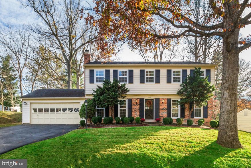 On a quiet tree-lined street in Bedfordshire, don't miss this beautifully updated & well-maintained 4 bedroom Colonial home! Ideal floor plan w/ gourmet eat-in kitchen overlooking the private & fully-fenced backyard w/patio. Large light-filled living room, family room w/ brick-surround fireplace, spacious master suite w/walk-in closet & updated bathroom.Basement perfect for storage. 2-car garage.