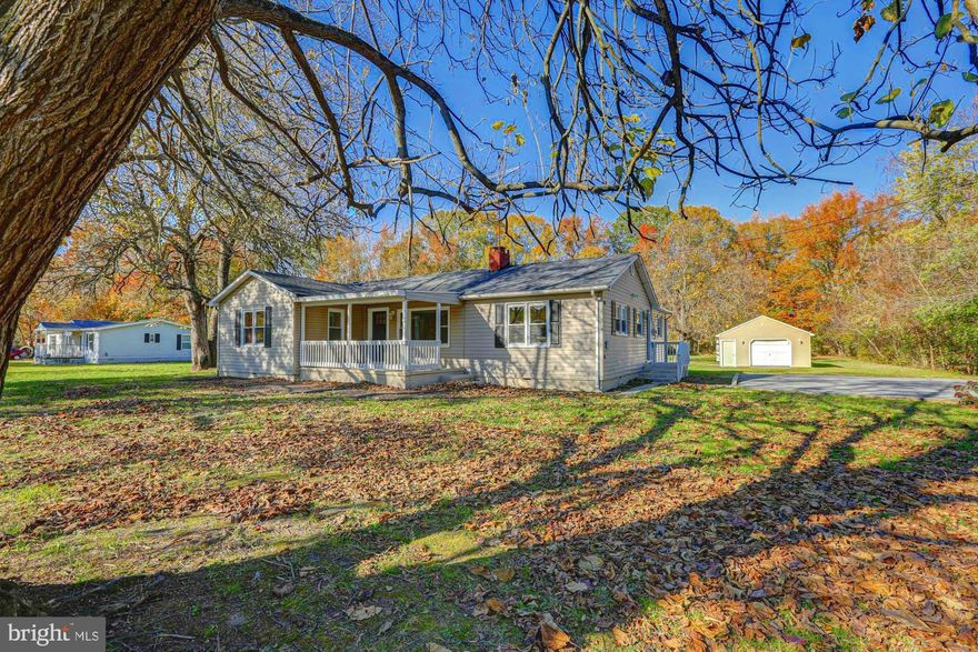 PRICE REDUCED!!! Welcome home to this beautifully renovated single-story ranch, perfectly blending modern updates with classic comfort. Featuring 3 spacious bedrooms and 2 full bathrooms, this charming home sits on over 1.5 acres of peaceful land—ideal for anyone seeking space, privacy, and the warmth of country living with the convenience of nearby amenities. The welcoming covered front porch sets the tone for this inviting property, offering a cozy spot to relax with a cup of coffee or hot tea on a beautiful spring morning. Step inside to find a bright and open living room with brand-new luxury vinyl plank flooring, fresh paint, and plush new carpet throughout. The large living area centers around a beautiful wood-burning fireplace—perfect for gathering with friends and family on chilly evenings. The heart of the home is the updated kitchen, featuring recessed lighting, stainless steel appliances, abundant counterspace, and a convenient pantry for storage. The open layout easily accommodates an eat-in dining space, making it ideal for everyday meals or entertaining guests. Just off the main living area, the spacious family room provides incredible versatility—create your own home theater, a quiet office, a playroom, or a hobby space. With plenty of natural light and room to spread out, this is a space that can truly adapt to your lifestyle. Outdoors, the possibilities are endless. The expansive yard offers ample room for a flower or vegetable garden, an inviting fire pit area for roasting marshmallows under the stars, or space to host weekend barbecues and outdoor gatherings. The oversized one-car garage and wide driveway offers plenty of parking for large vehicles, boats, or recreational vehicles. Additional highlights include a new roof (2018), new heater (2019), new well (2024), and main-floor laundry for ultimate convenience. Every detail has been carefully updated, making this home move-in ready. Perfectly located just a few miles from Route 13, this property provides easy access to shopping centers, grocery stores, restaurants, schools and fitness facilities while maintaining a quiet, private setting. Don’t miss your chance to make this beautiful, renovated home your own—schedule your showing today!