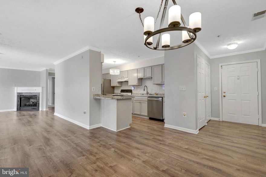 Come see this nicely done well kept condo on main level living in a secured building. True master suite with walk-in closet and sunk in bathtub. There is a gas fire place but it is as-is. LVP flooring with stainless steal appliances. Walk-in pantry and laundry area adds extra bonus storage. 1 assigned parking space and 2 additional parking permit passes given. Enjoy the covered balcony. Water is included in the rent. Walking distance to 2 lakes, major shopping, and community pool access option. Credit is a 650 minimum, income must be at least $79,200, pets are case by case with a $50 monthly pet rent.