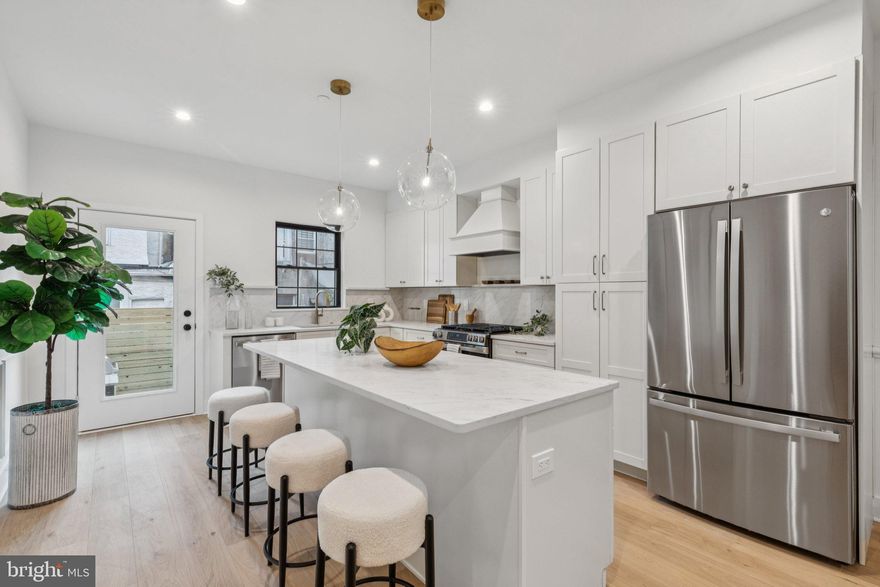 This property is scheduled for completion in March 2026. Pre-sale available. Photos on the MLS are from a builder’s sample home. Please reach out for additional details.

Welcome to 2316 Dickinson Street, a stunning 2,600 sq. ft. custom-built home located in the heart of Point Breeze. This 3-bedroom, 4-bathroom new construction showcases exceptional craftsmanship and luxury living, with convenient access to Center City, Rittenhouse Square, and I-76. Step inside to an open-concept living area featuring engineered hardwood floors and a gourmet kitchen equipped with custom cabinetry, a spacious island, and stainless steel GE appliances. The private backyard is ideal for entertaining, offering a built-in barbecue grill, artificial turf, and plenty of space for outdoor seating. The second floor features a large guest bedroom with an en-suite bathroom, a spacious walk-in laundry room with overhead cabinetry, an additional hallway bathroom, and another generously sized bedroom at the end of the hall. The primary suite includes a luxurious bedroom, a massive walk-through closet with custom built-in shelving, and a spa-inspired bathroom with a double vanity and a large glass-enclosed shower. Just outside the primary bedroom, enjoy access to a front balcony or head up to the expansive rooftop deck, offering breathtaking panoramic views of the city skyline, stadiums, and bridges. The finished basement provides a full bathroom and flexible space for an optional fourth bedroom, office, or entertainment area. Additional highlights include a 10-year tax abatement and a 1-year builder’s warranty. Don’t miss this rare opportunity to own a luxury home in the vibrant Point Breeze neighborhood. Showings are available now!