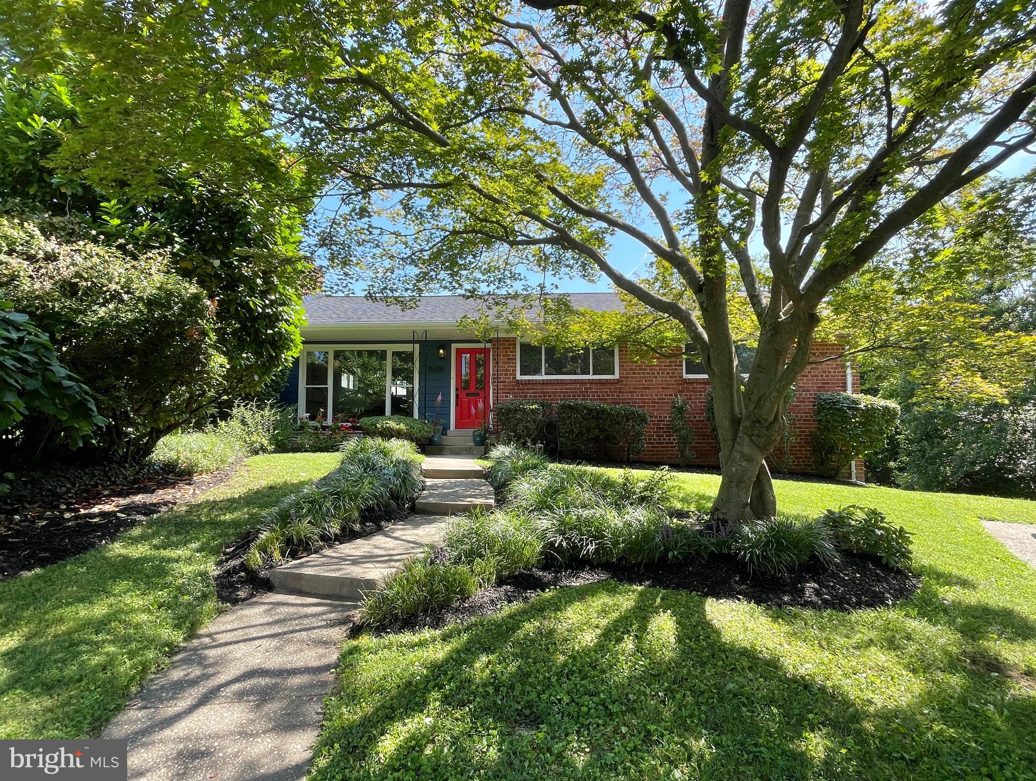 Welcome to 8605 Farrell Court — a stunning, expanded rambler on a quiet cul-de-sac in a sought after neighborhood. This thoughtfully updated home blends charm, functionality, and modern finishes inside and out.
The home boasts five bedrooms and two full bathrooms. Enjoy gleaming hardwood floors extended and refinished with European hardwax oil, complemented by new flooring in the kitchen and sunroom. The gourmet kitchen is a showstopper, featuring new stainless steel appliances, high-end quartz countertops, and recessed lighting. The sunroom off the back adds warmth and brightness, creating the perfect place to relax or entertain.
All bathrooms have been completely renovated with luxurious double vanities, elegant porcelain tile, and modern fixtures. The daylight lower level offers a spacious family room with a tiled gas fireplace and custom mantle, a full bathroom, a bar area with wood cabinetry and granite countertops, and direct walk-out access to the incredible backyard.
Step outside to a true outdoor oasis—a beautifully paved patio, two decks, and an expansive, landscaped backyard that includes a stream, garden beds, and frequent visits from local wildlife. Perfect for entertaining, play, or quiet reflection. A floored attic provides ample storage, and the new roof (2025) and new A/C (2020) offer peace of mind.
Located just steps from Rock Creek Forest Elementary, large neighborhood parks, stables and so much more. You'll love the strong sense of community, with annual neighborhood events and wonderful neighbors all around. All this within minutes of downtown Bethesda, Silver Spring, Washington, DC, and easy access to public transit.
Don't miss this rare opportunity to own a move-in ready home in an exceptional Chevy Chase location—spacious, stylish, and surrounded by nature and community. It's a 10!