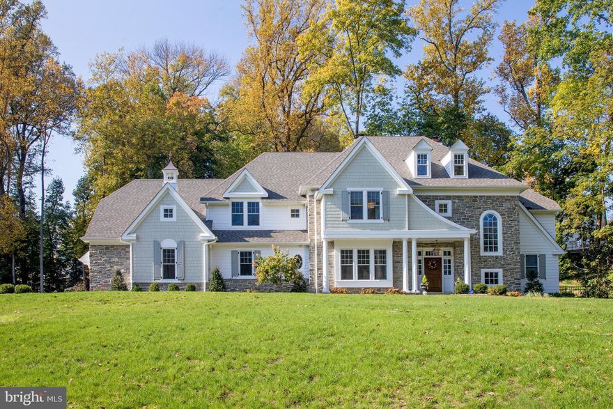 Nestled near the end of a private lane of only 7 homes, in a premier neighborhood with walk-ability to the charming town of Wayne, sits this 5 bedroom, 4 & 2 half bath residence. This newer construction gem, hand-crafted by renowned builder Chip Vaughan, is positioned on 2.27 acres and offers the quality & high-end features you would expect in a custom Vaughan creation. Every detail has been considered, from the gracious floor plan and well-proportioned rooms to the refined finishes, classic details and modern design. Outside, beauty and serenity surround you. Lush landscaped grounds with estate fencing afford sprawling lawn for family fun, and tall trees & shrubs for peace & privacy. There is even an acre+ secured by an invisible dog fence.  Best of all, you will love entertaining friends & family in the rear yard oasis featuring an in-ground pool with auto-retractable cover and flagstone patio you can enjoy well into the fall - all overlooking picturesque views.   Interiors are as warm and  welcoming, introduced by an airy double-height foyer. Gorgeous hardwoods, exquisite millwork & moldings, coffered ceilings & built-ins lend elegance throughout, while large windows bring in nature & generous light. The layout is ideal for family living, with plenty of room to be together or apart. Lounge with guests or sip wine & read a book in the lovely living room with fireplace. The dining room is perfect for Sunday dinners, wine tasting parties or any occasion, with a convenient butlers pantry nearby.  With its custom bookcases on 2 exposures and abundant natural lighting, the home office provides a beautiful background for video conferencing.  For those who love to cook & entertain, the open-concept chef?s kitchen, breakfast room & family room allows the cook to gather with family and friends.  This dream kitchen is appointed with a large marble topped center island, ceiling-high cabinets, 2 dishwashers flanking the sink, a 48" dual fuel range and a hidden walk-in pantry with 2nd refrigerator/freezer, sink, with faucet and Insta-hot & cold. Enjoy casual meals in the sunny breakfast room, relax around the fire in the stunning family room, and open the doors for seamless indoor-outdoor gatherings.   Sophisticated & calming, the primary bedroom is an inviting sanctuary.  A sitting area opens through double doors into the suite.  A domed ceiling, expansive dressing closet with window & island, additional walk-in closet, and high-end white marble bath with a soaking tub & spa shower heighten the luxury. Each spacious secondary en-suite bedroom also has its own walk-in closet. A custom-built 1750+ bottle wine cellar will accommodate your favorite vintages. Other highlights are abundant closets & storage, an unfinished lower level awaiting your custom finishes, oversized 3-car garage with high ceilings, 4-zone HVAC & 2 furnaces, water softener and filtration system, in a coveted Wayne location that is easy to forget how conveniently close you are to everything, including award winning Radnor schools.  Source of acreage is from Final Subdivision Plan submitted and accepted by Radnor Township in 1988.