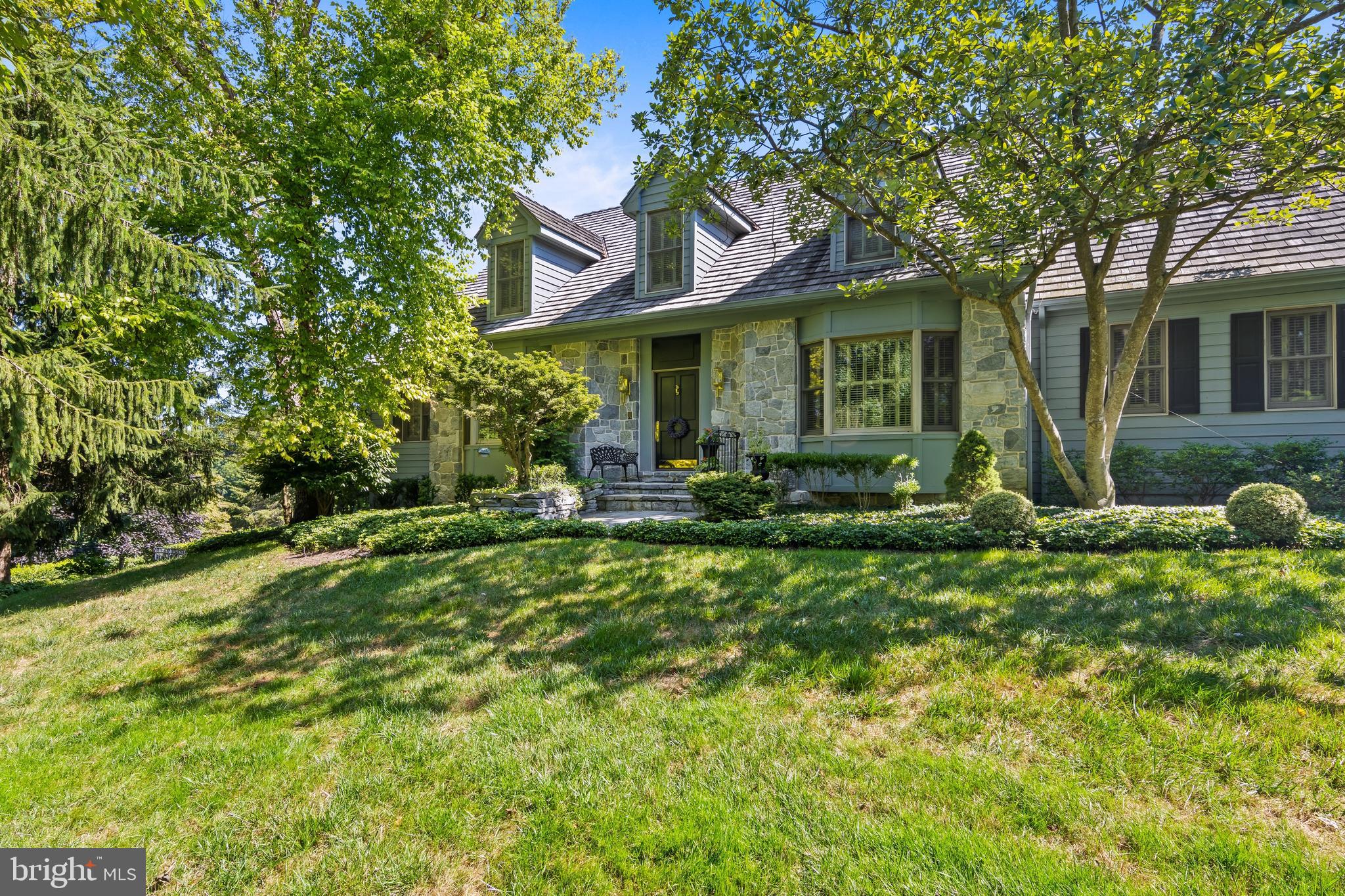This gorgeous single-family home is located in Blue Rock Meadows which is one of the most beautiful neighborhoods in Chester County. This is a special home - not your cookie cutter house. Quality, high-end details can be found throughout this home which was built in 1994. The current owners are original and helped design many of the features this home offers. They had great vision designing a home that is sure to please the most discriminating Buyer in 2022. You quickly realize as you enter the driveway that you are about to see a wonderful home. This 6-Bedroom, 4.2 Bath Cape Cod style home features a 3-Car Garage, Gunite In-Ground Pool and a fantastic Floor Plan. The Front Porch opens to a lovely Foyer that has 2 coat closets and a view to the fireplace in the Great Room. To the left off the Foyer is an Office with a wall of built-ins - to the right is the Formal Dining Room that also has built-in shelves and a large window overlooking the front yard. Spacious Eat-in Kitchen is open to a delightful Sunroom with incredible views that can be enjoyed 12 months out of the year. Just outside the Sunroom is an especially nice trex deck with stairs to the slate pathway to the pool. Spacious First Floor Primary Bedroom with full bath. An amazing Game Room (WOW!) with gorgeous built-ins plus a bar sink, ice machine, and small fridge is a really nice added bonus. There is also an extra-large laundry/sewing room with cabinets and a half bath on the main level. Second Floor has 5 Additional Bedrooms each with their own access to a Full Bath (2 Jack & Jill Baths and an Ensuite Bath). There is also easy Attic access for great storage. Basement is partially finished with a half bath and sliding door that takes you to the Pool Area. Extensive hardwood flooring, built-in cabinetry, plantation shutters, fine millwork and quality workmanship can be found throughout. Must be seen - too many details to list. Schedule your appointment today.