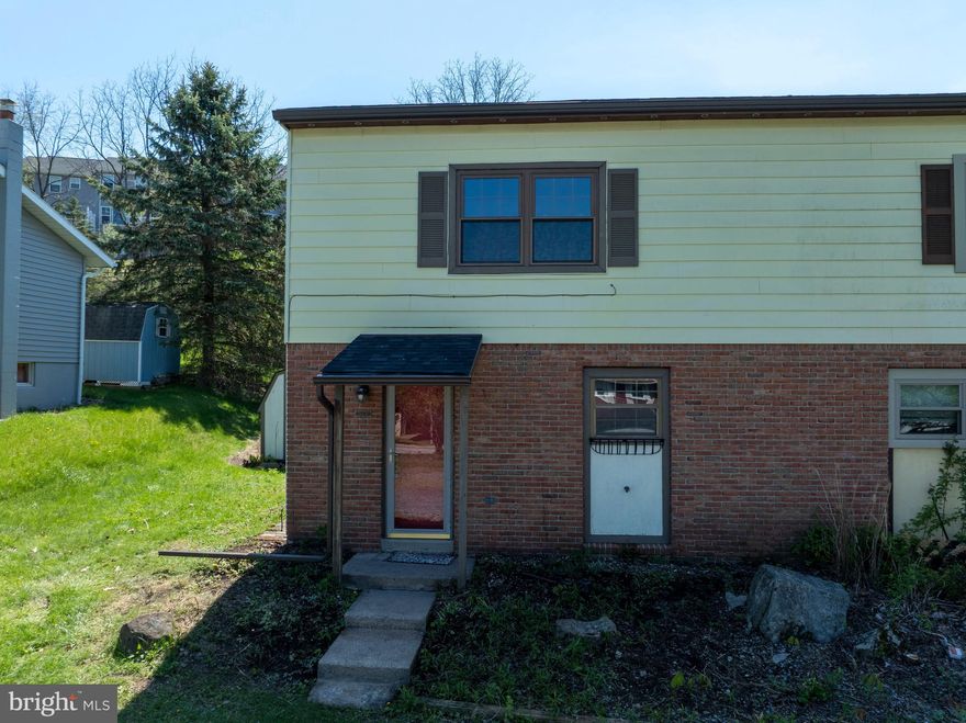 Opportunity awaits at this 3 bed, 1.5 bath half‑duplex condo in charming Boalsburg, close to local shops, parks, restaurants and everyday conveniences. With no HOA or monthly fees, it offers easy living in a great location. The main floor features vinyl flooring throughout, a spacious living room, adjoining dining area, an L‑shaped kitchen, and a convenient half bath, along with laundry closets. An enclosed porch with a knotty pine ceiling brings in natural light and overlooks a private backyard. Upstairs are three nicely sized bedrooms and a full bathroom. A shed provides additional storage options. With plenty of space, room to personalize and a brand-new roof (2026), this property in the heart of Boalsburg is ready for you! Call for a tour today!

Financing is difficult due to being non-warrantable so please check with listing agent for details.