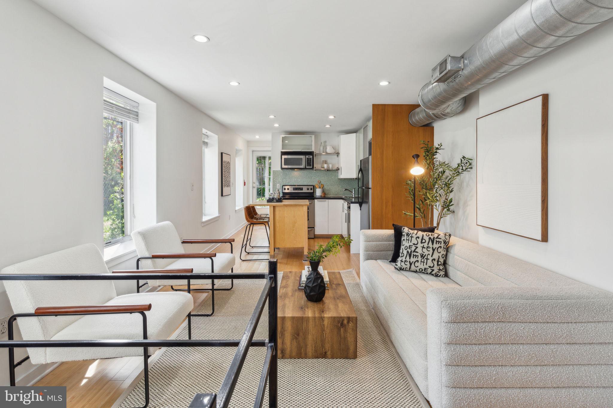 Welcome to 1006 N 5th Street, Unit 2, a modern 1-bedroom, 1 bathroom bi-level condo nestled in the vibrant Northern Liberties neighborhood of Philadelphia. This thoughtfully designed residence offers a spacious layout, featuring a comfortable living area, a well-appointed kitchen, and access to the unit's PRIVATE oversized outdoor patio - perfect for entertaining or simply dining al fresco! The lower level houses a spacious serene bedroom with brand new flooring, new oversized window, laundry closet and plenty of storage - a true private and quiet retreat within the home. The entire home has been freshly painted and has extremely LOW HOA's fees ($208 monthly) which cover water, common area maintenance, trash removal, and snow removal!
Situated in a trendy and eclectic area, this condo is surrounded by a network of coffee shops, bars, and restaurants, offering a dynamic urban lifestyle. With its modern design and premium upgrades, this property presents a unique opportunity to experience the best of city living in one of Philadelphia's coveted neighborhoods.