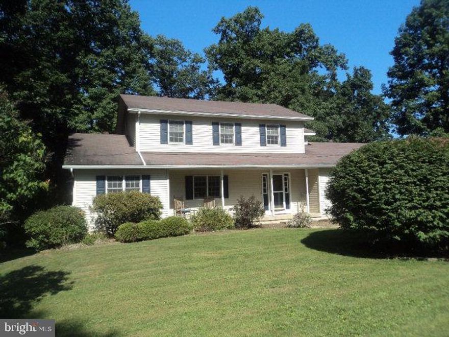 This home has it all, 4 bedrms, 2.5 baths. Enter the foyer which flows to the family room with built ins & large window over looking the private back yard. Formal living room w/hrdwd flrs, & dining rm. Kitchen includes breakfast bar, lots of cabinets & counter space, 1st flr laundry also. 2nd floor has 3 lrg bedrms, master walk in closet & full bath w/double vanity. Finished LL. has large rec. rm, 4th bedrm & office/gym space. French doors open to large patio w/ multi decks over looking large back yrd