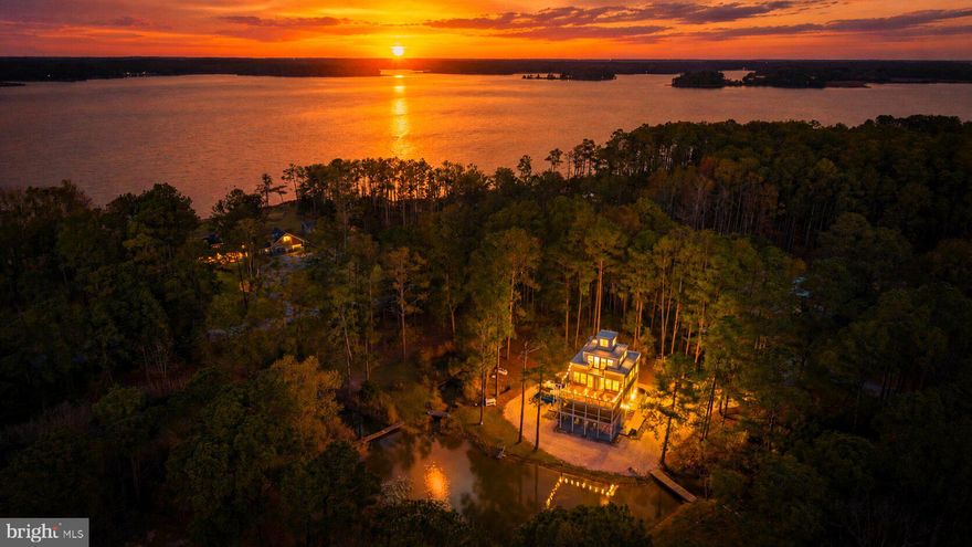 Set on just shy of 4.5 private acres at the end of a quiet dead-end road, this stunning property boasts over 2,700 square feet, five bedrooms, and an incredible 1,000 feet of water frontage—creating a rare combination of space, privacy, and panoramic views of coveted Little Choptank River.
Designed and built by an architect for their own personal retreat, this one-of-a-kind coastal waterfront sanctuary blends thoughtful design with the natural beauty distinct to the Eastern Shore.
Enjoy effortless waterfront living with your own private pier featuring 3’ mean low water, a protected lagoon, and endless opportunities for boating, jet ski'ing, crabbing/fishing, kayaking, and exploring nature abound. Surrounded by wildlife and untouched beauty, this is the kind of setting that feels worlds away—yet you’re just minutes from the charm, dining, and shops of downtown Cambridge.
And the opportunities don’t stop there!!--NO HOA and strong Airbnb potential make this not only a dream retreat, but a smart investment just in time for summer.