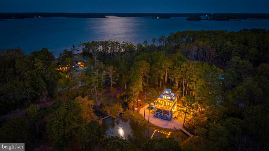 Set on just shy of 4.5 private acres at the end of a quiet dead-end road, this stunning property boasts over 2,700 square feet, five bedrooms, and an incredible 1,000 feet of water frontage—creating a rare combination of space, privacy, and panoramic views of coveted Little Choptank River.
Designed and built by an architect for their own personal retreat, this one-of-a-kind coastal waterfront sanctuary blends thoughtful design with the natural beauty distinct to the Eastern Shore.
Enjoy effortless waterfront living with your own private pier featuring 3’ mean low water, a protected lagoon, and endless opportunities for boating, jet ski'ing, crabbing/fishing, kayaking, and exploring nature abound. Surrounded by wildlife and untouched beauty, this is the kind of setting that feels worlds away—yet you’re just minutes from the charm, dining, and shops of downtown Cambridge.
And the opportunities don’t stop there!!--NO HOA and strong Airbnb potential make this not only a dream retreat, but a smart investment just in time for summer.