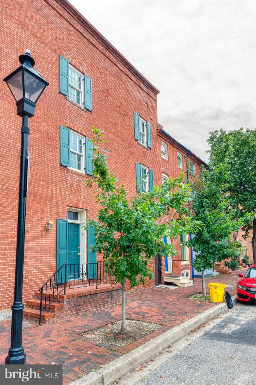 This light-filled, 3-level Otterbein apt is a short walk to the Inner Harbor, light rail, MARC, UMD and major highways. Great views of Camden Yards! Spacious living room w/ hardwood floors. Two large bedrooms w/ ample closet space. Located in a charming neighborhood w/ many parks and plentiful parking. Washer/dryer in unit. Dog friendly, case by case basis. Unit is 1000 sq ft, tax record incorrect