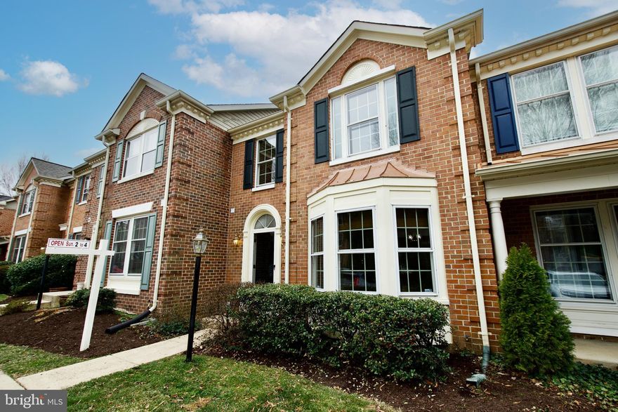 Over $25,000 in recent upgrades...Dream no more...stunning 3 level brick townhouse...lovingly maintained...just professionally painted and new carpet installed in bedrooms....new luxury wide plank flooring installed in dining room and living room....new microwave...new quartzite kitchen countertop with new sink and new disposer...spacious separate dining room...country kitchen with table space...roomy trex deck...big bay window...cathedral ceilings...walk out basement with a cozy gas fireplace leads to a fenced backyard with patio...Full bath in walk-out basement...new roof was installed about 2020... One Year Super Home Warranty conveys at settlement to new buyer(s) worth up to $799...reasonable HOA fee includes front yard maintenance, trash, snow removal...two assigned parking spaces...sought after Fairfax County school system...close to shops & restaurants...on bus line to metro...see also list of special features...must see to appreciate the beauty and value!!!