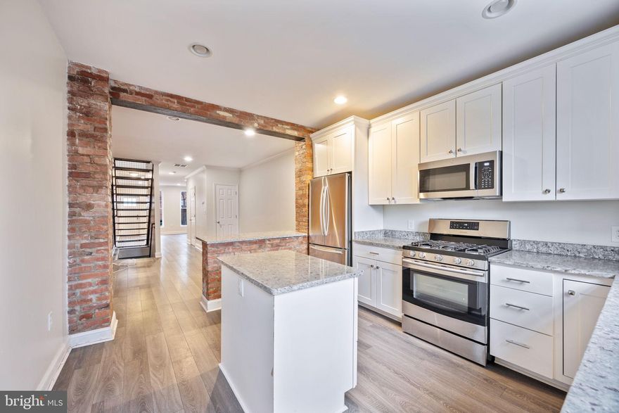 Welcome to 1180 Nanticoke, a beautifully updated 2-bedroom, 2.5-bath residence in historic Pigtown, where modern finishes meet classic Baltimore charm. Step inside to find exposed brick, recessed lighting, and an abundance of natural light throughout. The updated gourmet kitchen features granite countertops, a stainless-steel appliance package, and a breakfast bar. Off the kitchen is a spacious outdoor patio with a fully enclosed privacy fence and is perfect for entertaining, gardening and relaxing during the cool months!

Upstairs features new LVP floors, 2 spacious bedrooms, a full bathroom and storage space. The finished basement offers a full bathroom & bonus room that can be utilized as a 3rd bedroom, den or home office.  

Conveniently located just minutes from downtown, Ravens & Orioles stadiums, local shops and restaurants! Schedule a tour today and call this home!