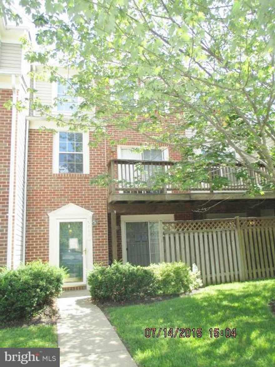 Large townhome condo in a most convenient location. First level has a family room and half bath.  Main level includes living room w/fireplace, dining room, deck, kitchen and another 1/2 bath. Three bedrooms and 2 bath are located on upper level. All rooms are spacious and most include ceiling fans.