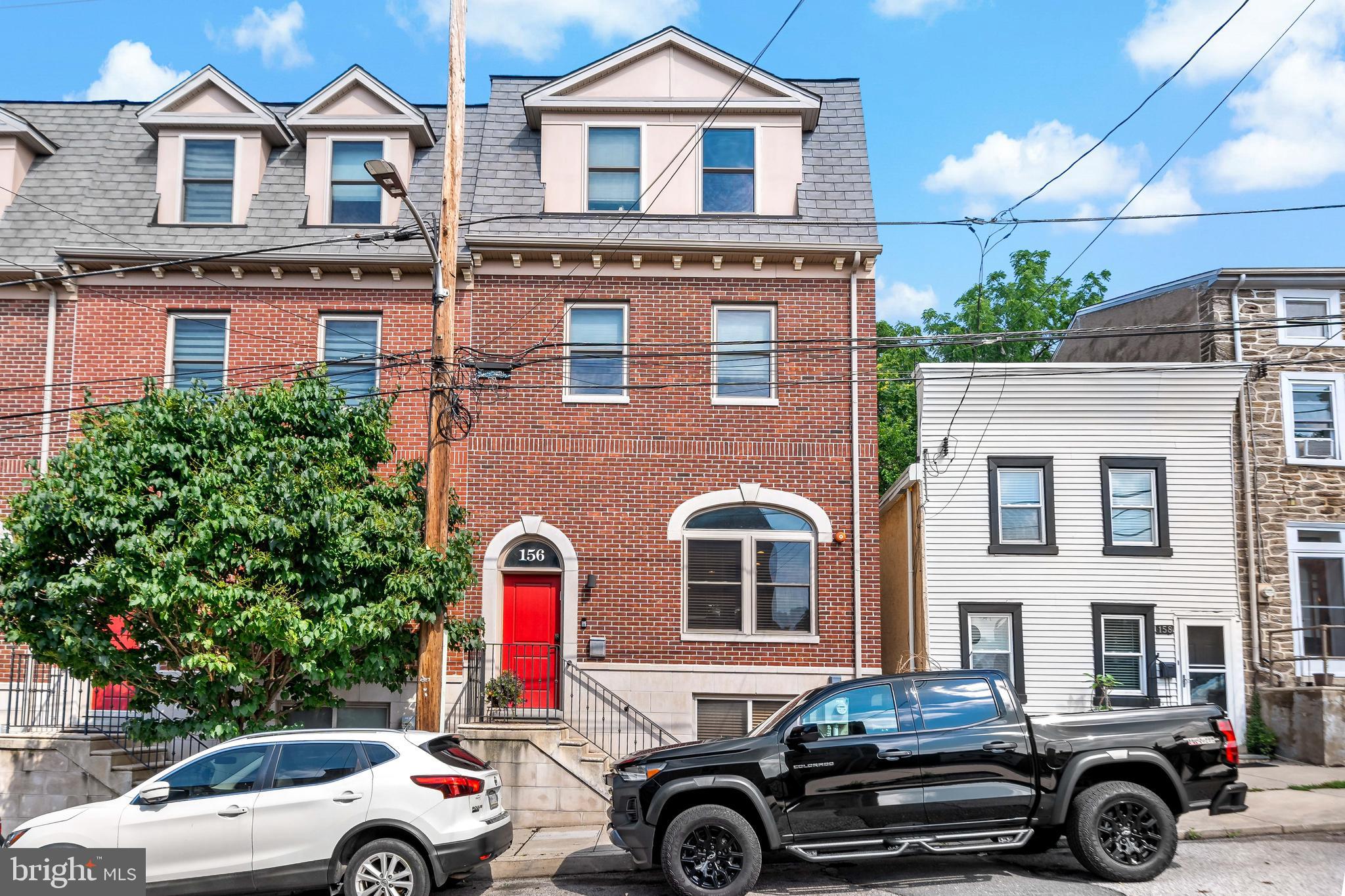 Nestled in the vibrant Manayunk section of Philadelphia, this beautifully maintained single-family townhome constructed in 2017 offers the perfect blend of city living and suburban convenience. Featuring 3 spacious bedrooms each with extravagant closet space, an office or nursery, 2 large full baths, and a convenient half bath, this home is designed for both comfort and style.
Enjoy a bright, spacious kitchen outfitted with modern stainless-steel appliances, an island perfect for both cooking and entertaining, plentiful cabinet space, a second sink, and a wine fridge! The living room and separate dining area flow from the kitchen, with a large den/recreation room below. Hardwood floors flow throughout the home, adding warmth and character to every room. High ceilings and unique transom windows throughout create a bright and airy feel. Along with 2-zone air conditioning and heating, all bedrooms and the living room have ceiling fans for added comfort. 
Enjoy seamless indoor-outdoor living with a charming back porch and a private roof deck — ideal for entertaining or unwinding under the stars. Parking is a breeze with 4 private spaces — a 2-car garage plus a 2-car driveway — a rare find in Manayunk.
Located just steps from Main Street, you’ll enjoy easy walking access to top restaurants, boutique shopping, and year-round street festivals. Commuters will love the quick walk to the Manayunk Station for convenient regional rail service to Center City, and easy access to the Schuylkill Expressway. This property offers the best of comfort, convenience, and community in one of Philadelphia’s most sought-after neighborhoods.