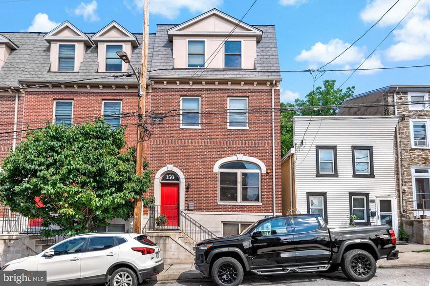 Nestled in the vibrant Manayunk section of Philadelphia, this beautifully maintained single-family townhome constructed in 2017 offers the perfect blend of city living and suburban convenience. Featuring 3 spacious bedrooms each with extravagant closet space, an office or nursery, 2 large full baths, and a convenient half bath, this home is designed for both comfort and style.
Enjoy a bright, spacious kitchen outfitted with modern stainless-steel appliances, an island perfect for both cooking and entertaining, plentiful cabinet space, a second sink, and a wine fridge! The living room and separate dining area flow from the kitchen, with a large den/recreation room below. Hardwood floors flow throughout the home, adding warmth and character to every room. High ceilings and unique transom windows throughout create a bright and airy feel. Along with 2-zone air conditioning and heating, all bedrooms and the living room have ceiling fans for added comfort. 
Enjoy seamless indoor-outdoor living with a charming back porch and a private roof deck — ideal for entertaining or unwinding under the stars. Parking is a breeze with 4 private spaces — a 2-car garage plus a 2-car driveway — a rare find in Manayunk.
Located just steps from Main Street, you’ll enjoy easy walking access to top restaurants, boutique shopping, and year-round street festivals. Commuters will love the quick walk to the Manayunk Station for convenient regional rail service to Center City, and easy access to the Schuylkill Expressway. This property offers the best of comfort, convenience, and community in one of Philadelphia’s most sought-after neighborhoods.