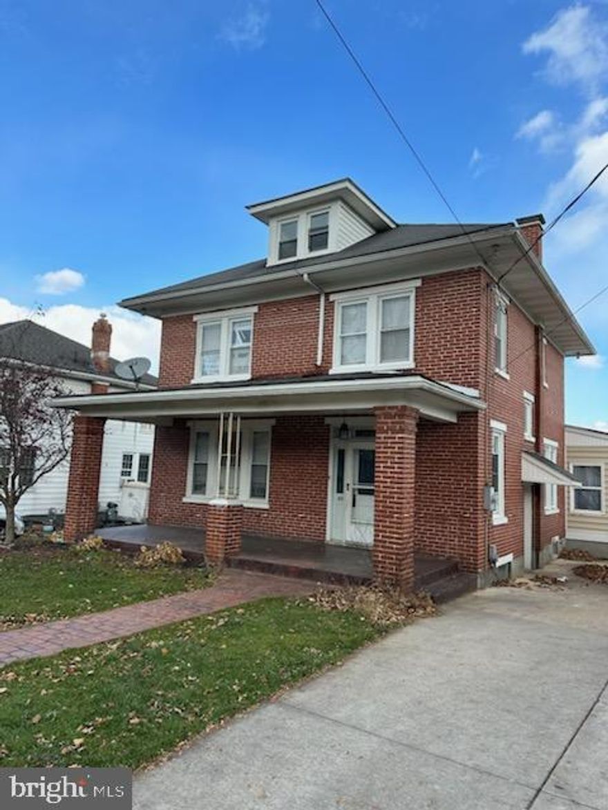 Solid brick detached colonial in Central school district.  3-4 BR with a large fenced yard and above ground pool. There is a 2 car garage with 4 off-street parking spaces.  In addition there is a large 3+ bay commercial garage and tons of off-street parking.