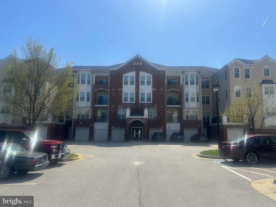 This is the one you’ve been waiting for! This beautifully maintained 3-bedroom, 2-bath condo truly has it all—complete with a 1-car garage and an extra deeded storage room. Step inside to discover elegant tray ceilings, crown and picture frame moldings, 42" cabinets, granite countertops, stainless steel appliances, and a spacious open layout with hardwood and ceramic tile flooring. The oversized primary suite is a true retreat, featuring double vanities, a soaking tub, separate shower, and a generous walk-in closet. Enjoy your morning coffee or unwind in the evening on your private balcony. Additional highlights include ceiling fans, a new gas water heater, and an in-unit sprinkler system. This home has been lovingly cared for by the original owner and it shows! Located in a gated community with fantastic amenities—all just minutes from the MARC train, airport, shopping, dining, and more. Convenience, comfort, and style all in one—schedule your showing today!