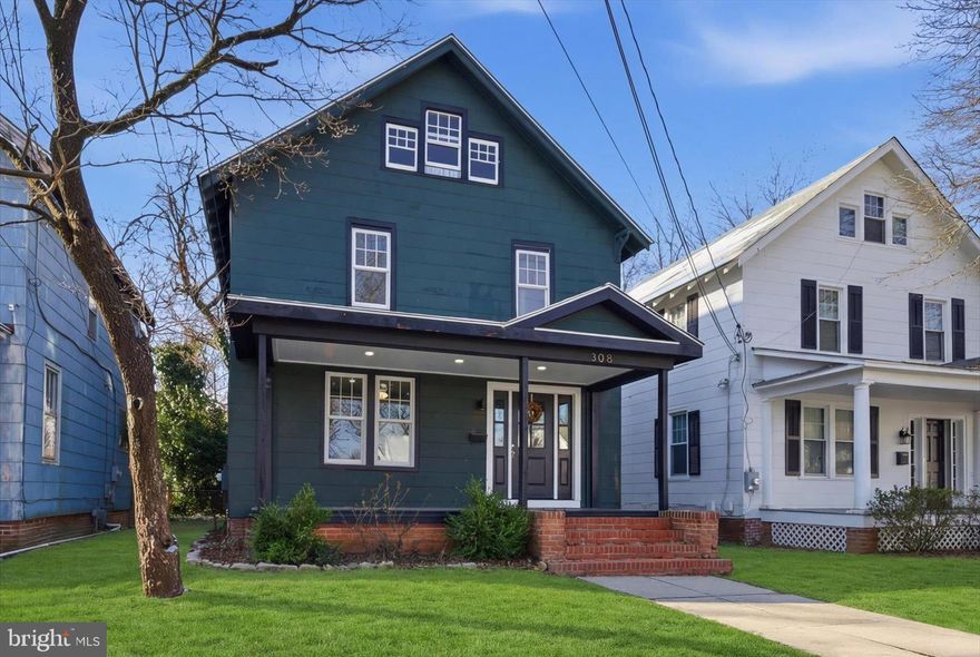 Classic Craftsman charm meets modern-day livability in this beautifully updated historic home in the heart of Salisbury. Rich in character and architectural detail, this three-bedroom residence offers a rare blend of timeless design and an open, updated floor plan that suits today’s lifestyle. From the moment you arrive, the inviting front porch and striking brick stoop set the tone for the warmth and charm found throughout. Step inside to a grand, light-filled main level where original details take center stage, wide window molding, substantial baseboards, and an impressive staircase accented with dentil molding all speak to the home’s historic roots. The front entry makes a lasting impression with elegant sidelights and a welcoming sense of scale. The spacious living room flows seamlessly into a generous dining area and an updated kitchen, creating an open-concept layout that feels both airy and connected. High ceilings and abundant natural light enhance the sense of space, while warm luxury vinyl plank flooring pairs beautifully with the original hardwood staircase. The kitchen blends old-world charm with modern convenience, featuring exposed brick, stainless steel appliances, a walk-in pantry, and direct access to the covered rear deck, perfect for easy indoor-outdoor living. Upstairs, a wide, open landing leads to three comfortable bedrooms, offering a layout that feels open and inviting. A full bath serves the upper level, and a rear bedroom provides access to a charming second-floor screened porch, an ideal spot to relax and unwind. Additional highlights include a walk-up third-floor attic offering excellent storage or potential for future use, along with a basement that provides even more room for storage. This is a truly special home where historic character and thoughtful updates come together to create a warm, inviting, and highly livable space.