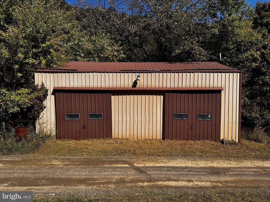 2 ADJOINING TRACTS OF LAND EQUALLING .93/ACRE. 40 X 24 GARAGE ON .32/ACRE WITH CONCRETE FLOORS, (2) 10 X 10 METAL SLIDING GARAGE DOORS, METAL ROOF, 100’ OF ROAD FRONTAGE, ALL TOOLS/TOOL BOXES INCLUDED, OLDER ATV, OLD BOAT, (2) OLD CARS AND PERSONAL PROPERTY CONVEY. SECOND .61 ACRE TRACT OFFERS MOBILE HOME SITE READY TO GO. ALL UTILITIES ON SITE, PRIVATE SETTING AND UNRESTRICTED!!!! UNLIMITED POTENTIAL….. BUSINESS OPPORTUNITY AND HOME SITE!