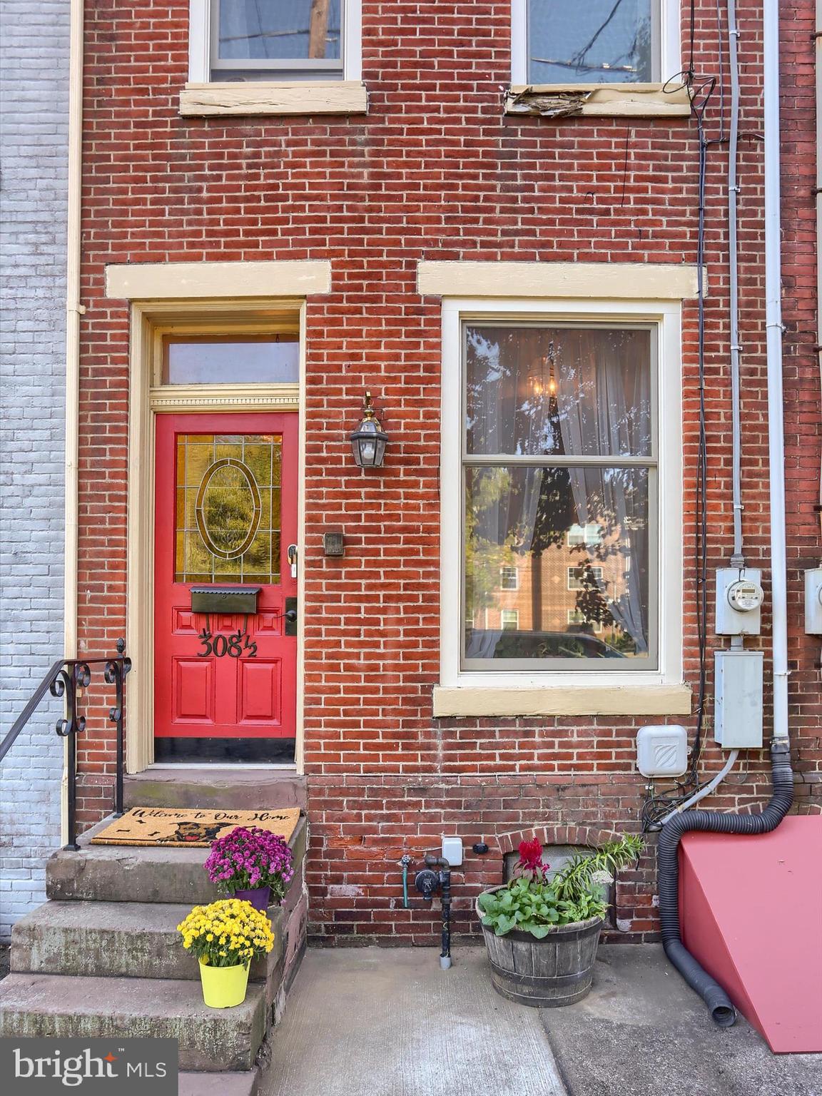 Welcome to your new home in the heart of historic Harrisburg!
Full of character and modern comforts, this beautifully maintained residence offers three spacious bedrooms and so much more to love.
Step inside and you’re immediately greeted by soaring 10-foot ceilings and the original arched wooden door that leads from the foyer into a cozy, light-filled living room. Gorgeous oak floors run throughout the first floor, adding warmth and elegance, while crown molding and a marble gas fireplace create a perfect place to unwind or entertain. A stunning bow window with built-in surround seating adds a charming and sunlit nook—perfect for reading, relaxing, or simply enjoying the view.
The dining room flows seamlessly into a stunning eat-in kitchen, complete with quartz countertops, a gas range, stainless steel appliances, deep sink, and a stylish tile backsplash. A charming back staircase adds a touch of historic flair, and a door off the kitchen leads to your peaceful garden retreat—complete with a new brick patio perfect for morning coffee or evening gatherings.
Upstairs on the second floor, you’ll find two comfortable bedrooms, a fully renovated bathroom with tile flooring, new vanity, and updated walk-in shower, plus a dedicated laundry room. The rear bedroom even has a private balcony overlooking the garden! There’s also a second living area on this floor, offering flexible space for a den, office, living space, or playroom—all with 9-foot ceilings and great closet space.
The third floor features an additional carpeted bedroom with another full bathroom—ideal for guests or a private primary suite.
Major updates in 2025 include brand-new forced air gas heating and central air system, five front-facing Renewal by Andersen windows, and a new hot water heater—giving you peace of mind for years to come along with a 1-year AHS Warranty being offered to the new homeowner.
Best of all, every room comes tastefully furnished —just bring your bags and settle in!
Ideally located just minutes from Harrisburg Hospital, HACC Midtown Campus, and Temple University Harrisburg, with easy access to shops, restaurants, and other great local amenities, this home is ideal for students, healthcare professionals, or anyone seeking convenience and comfort.
Whether you're looking for a personal residence or a turnkey investment, this home is truly one-of-a-kind. Come see it today!