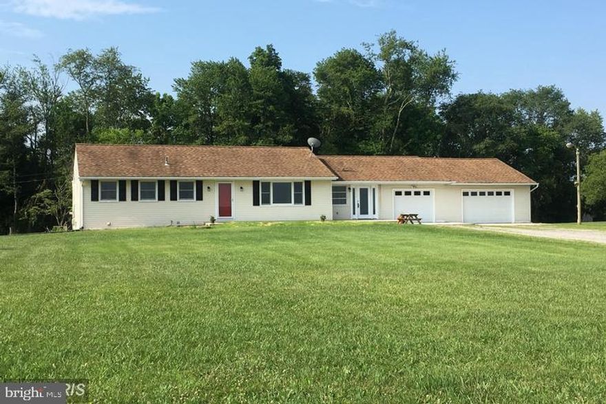 Hard to find rental of a spacious 3 bedrooms, 2 bath Rancher on 2.5 Acres in Northern Howard Co near Rt #32 & I-70! Property  includes attached garages! Includes  refrigerator & washer, dryer, updated  windows, exterior doors & slider, updated 6 panel interior doors.  Main level full bath w/tub/shower combo, lower level bath has corner shower. Tenant responsible for utilities and lawn. (see aerial photo) Well maintained. Min 12 month lease subject to credit and income verifications. New carpet and freshly painted just completed on the main level. 1 dog under 40 lbs considered at $2,700 mo. Avail immediately.