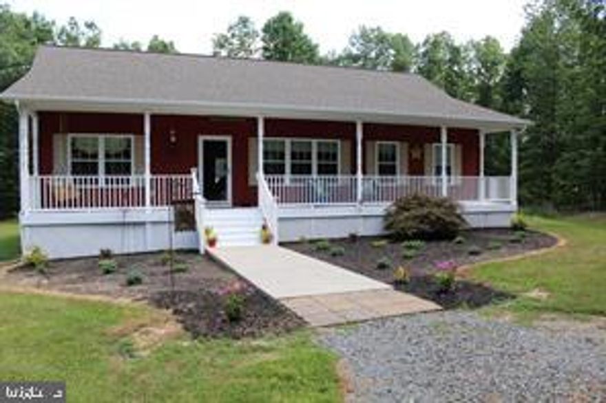 Welcome Home to 2365 Hanback Road. This beautiful ranch home has been meticulously maintained. It was designed for entertaining. The stunning custom kitchen features a 6 burner Italian made gas stove, newer refrigerator and dishwasher along with a deep farm sink and quartz countertops. The custom kitchen overlooks the family room and dining area. The perfectly open design of this home lends well to entertaining. There's a gas fireplace also in the large family room. There are hardwood floors throughout the main living area.  A large master suit with a master bath and  a walk in closet. Along with 2 additional bedrooms with a guest bathroom.  
This home is perfect for entertaining as there's a huge rear deck and a beautiful front porch that is perfect for gathering or just hanging out. The home also boasts a covered parking area and 6.945 acres of privacy. 
Location, Location, Location! 2365 Hanback Road is close to the picturesque small town of Gordonsville, but is also just a short drive to Charlottesville, Zion Crossroads or Richmond.