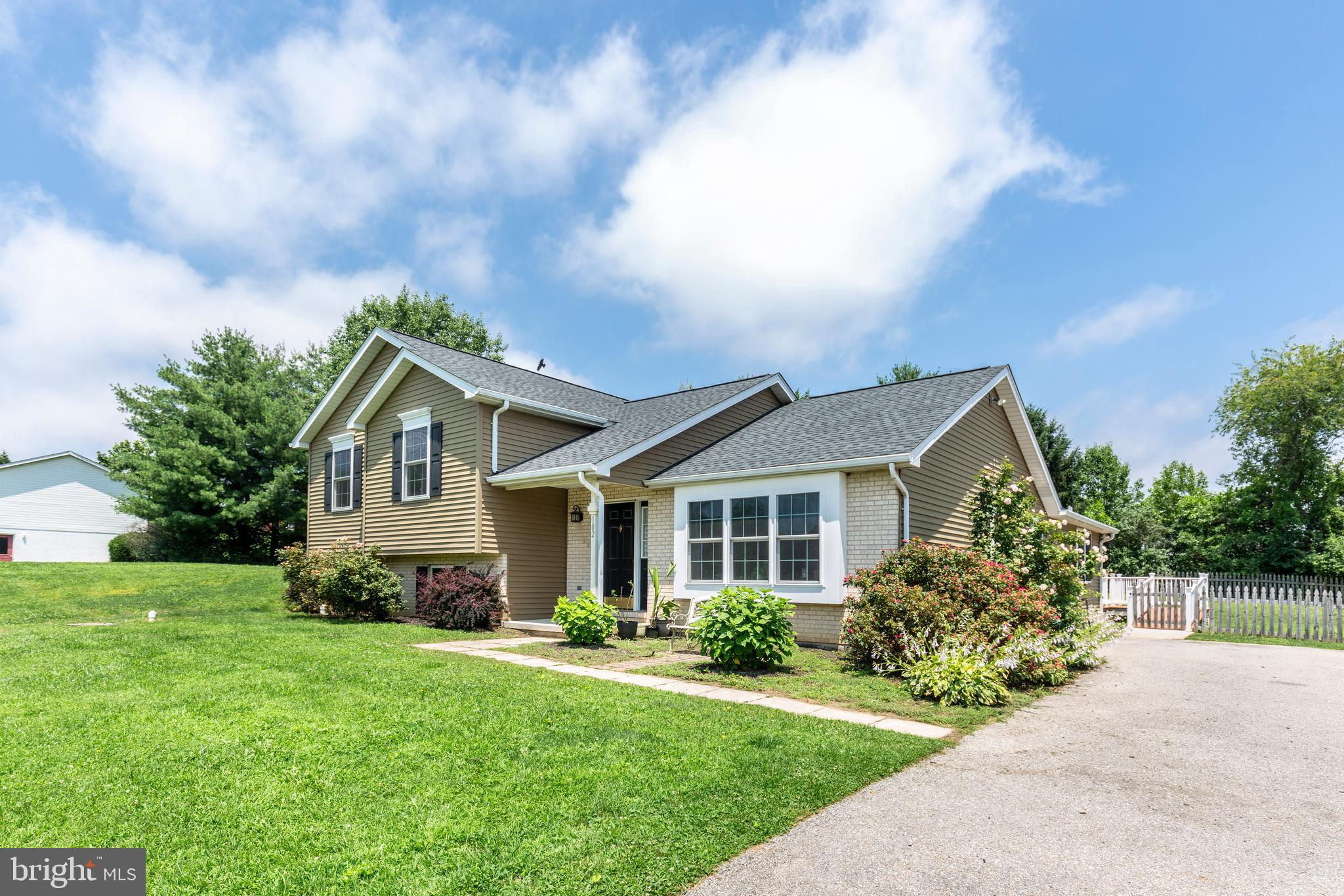Dramatic price improvement!
Located just minutes from the MD line, this beautiful and unique 6 bedrooms and 4 full bath home is ready for multi-generational living and boasts just short of 4000 sq ft of finished living space on an acre of land, with a completely separate 2 BR in law apartment with handicap access and roll in shower.
Entering from the side door, you'll step into a beautiful gourmet kitchen, with gleaming granite countertops, custom cabinetry, a huge center island with a breakfast bar and seating for 6. Off the back of the home, you'll find a completely separate apartment with it's own entrance, fully appointed kitchen, living room and two amply sized bedrooms with a walk in shower and washer/dryer hook-up. An above grade, sunlit in-law suite is a rare find that someone will truly appreciate!
Around the other wing of the home, on the upper level is a spacious primary bedroom with it's own bathroom. 2 more bedrooms round out this level. Below that are yet two more levels, one with a huge bedroom and full bath that could really be a 3rd separate living space, or use it as a family room/living room . Could easily be set up with a small kitchenette for completely independent living and has a hook-up for washer/dryer.
Large unfinished area on the very lower level gives you room for storage. The home sits on an acre of land and has a nice deck out back for outdoor living!
If you are looking for a unique home close to the MD line with plenty of room for the whole gang to spread out, this is it! This home is eligible for 100% no money down financing and will not last, set up your private showing today!