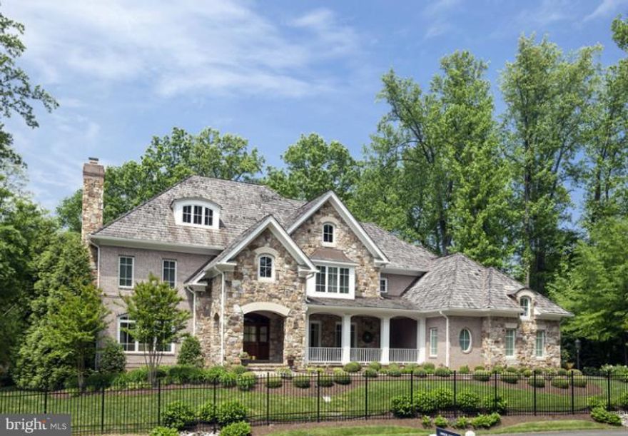 JUST LISTED! This elegant stone & brick home features gorgeous hdwds, formal LR & DR, family rm w/ coffered ceiling, gourmet kitchen with breakfast room, study with built-ins, 5 BRs up including a stunning master suite,rec rm, media rm, billiards area, 2nd kit, exercise rm & Au-pair suite, fully fenced, back deck, LL patio, beautiful landscaping whole house gen, irrigation syst, & 3 car gar.