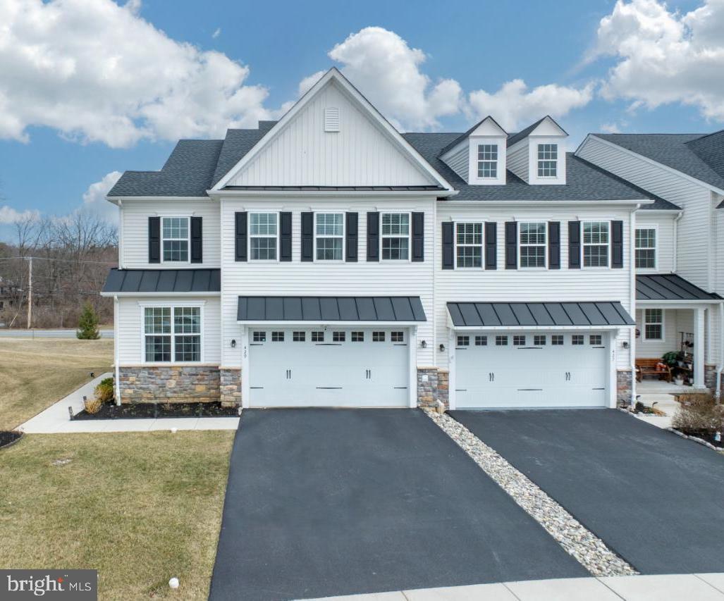 Welcome to 429 Lee Pl, a luxurious carriage home in the Waterloo Reserve community in Exton. This home offers 5 spacious bedrooms, 4.5 baths, and exceptional design across multiple levels with over 4100 sqft of living space. The home features two primary suites—one on the main floor and one on the upper level—perfect for multi-generational living. The open-concept layout includes a gourmet kitchen with premium stainless-steel appliances, a spacious living area with a fireplace, and a private deck with panoramic views.
The custom-finished basement is designed for entertainment, with a home theater, wet kitchen, recreation room, and gym. Enjoy the double-sized paver patio and landscaped backyard for outdoor gatherings. The home also offers a two-car garage, security system, and ample storage space throughout.
Waterloo Reserve offers maintenance-free living with lawn care, landscaping, and snow removal handled by the HOA. Conveniently located near major highways, shopping, dining, and top-rated schools, this home provides the perfect blend of luxury, convenience, and community. Don’t miss the opportunity to own this exceptional property—schedule a showing today!