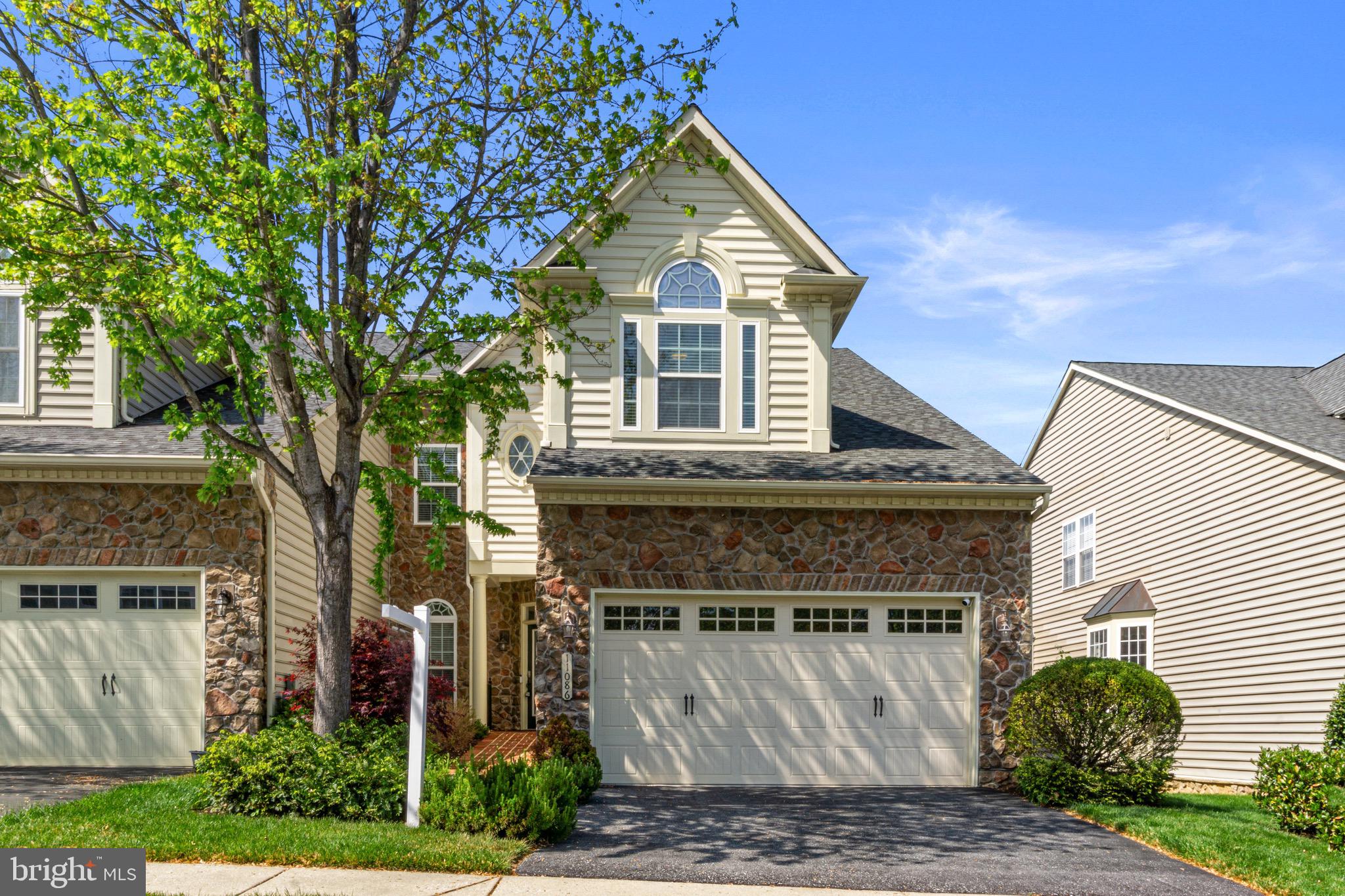 Better than buying new! Beautiful 55+ NV Villa in Waverly Woods. This is one of the largest units with the most finished sq ft. over 3000 sq ft above grade with 1900 finished lower level. End unit 2 car garage with hardwood floors through the main level. Spacious Main Level Primary bedroom with 9+ ceiling and tray ceiling. Extended sunroom leads to a composite deck overlooking the golf course. Huge primary bedroom with tray ceiling and beautiful bath with soaking tub and walk in shower. Spacious upper level with 2 bedrooms, Jack & Jill bath and open loft. Plenty of storage on all levels. Fully finished lower level with gorgeous bar, and multiple work / craft rooms. walk out stairs. this community has plenty of amenities to satisfy everyone. walk across the street to the club house and pool .