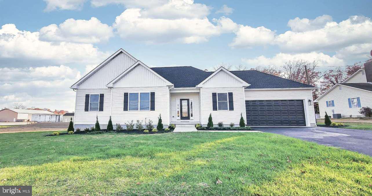NEW CONSTRUCTION, EAST VINELAND. This is your opportunity to own the most luxurious new home in East Vineland. This spectacular 3-bedroom, 2 and one half bath on half an acre is more than just a home; it is opulently designed. As you step inside, you'll immediately be drawn to a beautifully tiled linear fireplace and oak floors. The heart of the home is the gourmet kitchen which features a gas stove, dishwasher, farm sink, and fully tiled backsplash. This home also features all black fixtures and hardware that feels robust and looks divine. This home is truly designed for everyday living and entertainment. Custom finished basement with bathroom and entertainment Bar. Recess lighting and scratch proof flooring. The main suite is a haven of luxury; with an expansive walk-in closet, tiled bathroom with Calacatta quartz, and an extra closet for more clothing space. New custom land spacing and concrete patio features. Completely new fenced in 6ft custom fence lifetime warranty. This brand-new construction home is a masterpiece of design and craftsmanship, offering an unmatched lifestyle in the nicest part of Vineland. Don't miss your chance to own this extraordinary property. It is truly a must see!