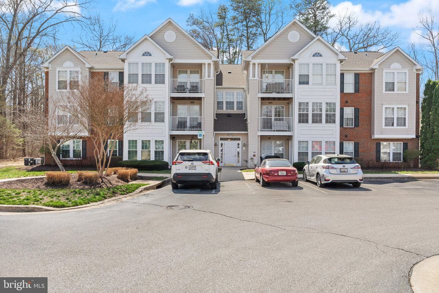 Welcome to this beautifully maintained 2-bedroom, 2-bathroom condo, seamlessly situated, backing to trees with peaceful views of the Piney Orchard Nature Preserve. This unit offers the ideal blend of comfort and modern living, with miles of walking, jogging, and hiking trails just outside your door, catering to all fitness levels. The condo has a sunroom that opens to a private deck, providing a peaceful space to relax and enjoy the natural surroundings. Inside, the primary bedroom includes an en-suite bathroom for added privacy, updated kitchen with stainless steel appliances and spacious pantry.  The living space is designed with  upgraded flooring and an in-unit washer and dryer for convenience. As part of the Piney Orchard community, residents enjoy access to three outdoor pools, an indoor pool, pickle ball courts and a fully-equipped gym at the community center. The Piney Orchard Community is commuter's dream... 25 minutes to Baltimore or Annapolis. 35 minutes to D.C. and approximately 5 minutes to the Odenton MARC station. Short walk to shopping and restaurants.
This condo offers the perfect combination of nature, comfort, and top-notch amenities, making it a wonderful place to call home in Anne Arundel County.