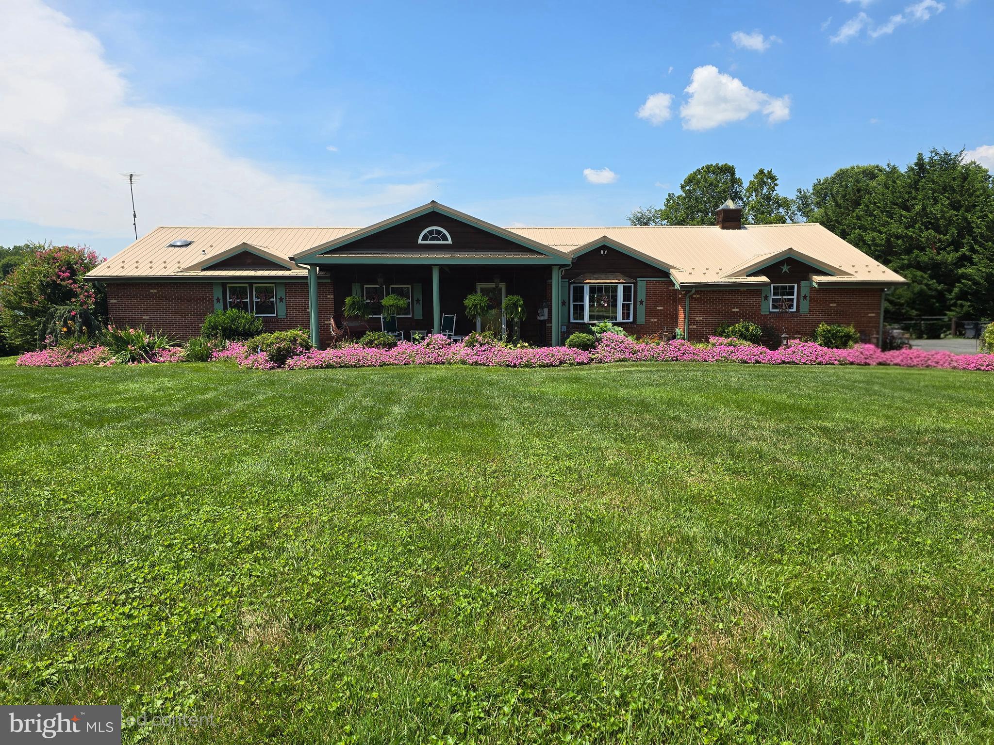 Welcome to 757 Doctor Miller Road in North East, Maryland where comfort meets country living on nearly 3 acres! This well-maintained 4-bedroom, 2 full bath home offers the perfect blend of functionality, charm, and space, both inside and out.
Step inside to find hardwood floors throughout the home, adding warmth and character to every room. A metal roof adds long-lasting durability and peace of mind. The spacious interior layout is perfect for entertaining, or simply enjoying quiet evenings at home. Appliances & a whole house generator are included.
Out back, you'll find two large decks overlooking the open yard, ideal for entertaining, relaxing, or soaking in the surrounding nature. Car enthusiasts, hobbyists, or anyone needing extra space will appreciate the massive 40' x 22' three-bay detached garage with electric and water already installed.
For those dreaming of a hobby farm or needing room for animals and storage, this property also features a 28' x 14' animal building and a 28' x 14' shed. Plus, enjoy the convenience of an attached 2-car garage for everyday use.
Located just minutes from the town of North East, shopping, and commuter routes, this property offers the peace of the country with everyday convenience. Don’t miss your chance to own this versatile and beautifully maintained home!